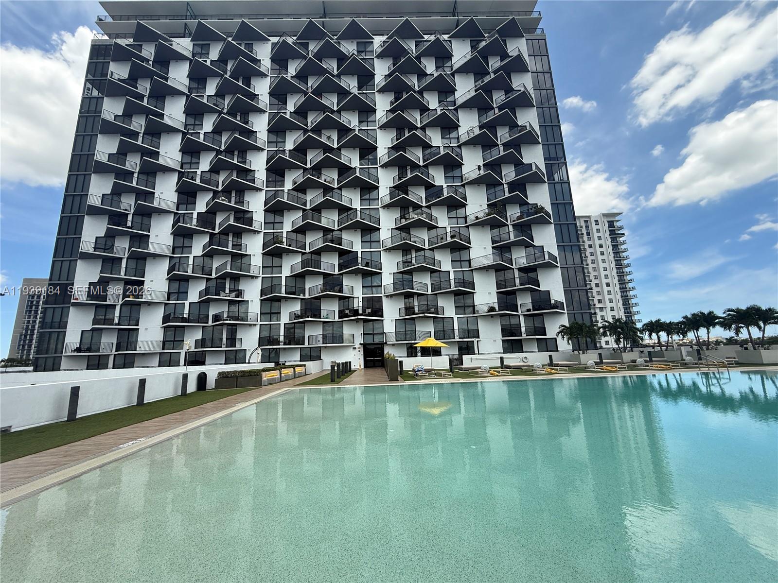 Live in the Heart of Downtown Doral! Spacious and modern 2-bedroom, 2-bathroom unit featuring a large principal bedroom with a walk-in closet, sleek tile flooring throughout, and an open kitchen with stainless steel appliances and stone countertops. Enjoy abundant natural light and beautiful views through expansive windows. Rent includes water, internet, and cable. The building offers 24-hour concierge service, valet parking, and top-notch amenities. Prime location—steps from highly rated charter schools, restaurants, shops, and more. Minutes to Miami International Airport, FIU, Miami Dade College, and Dolphin Mall.