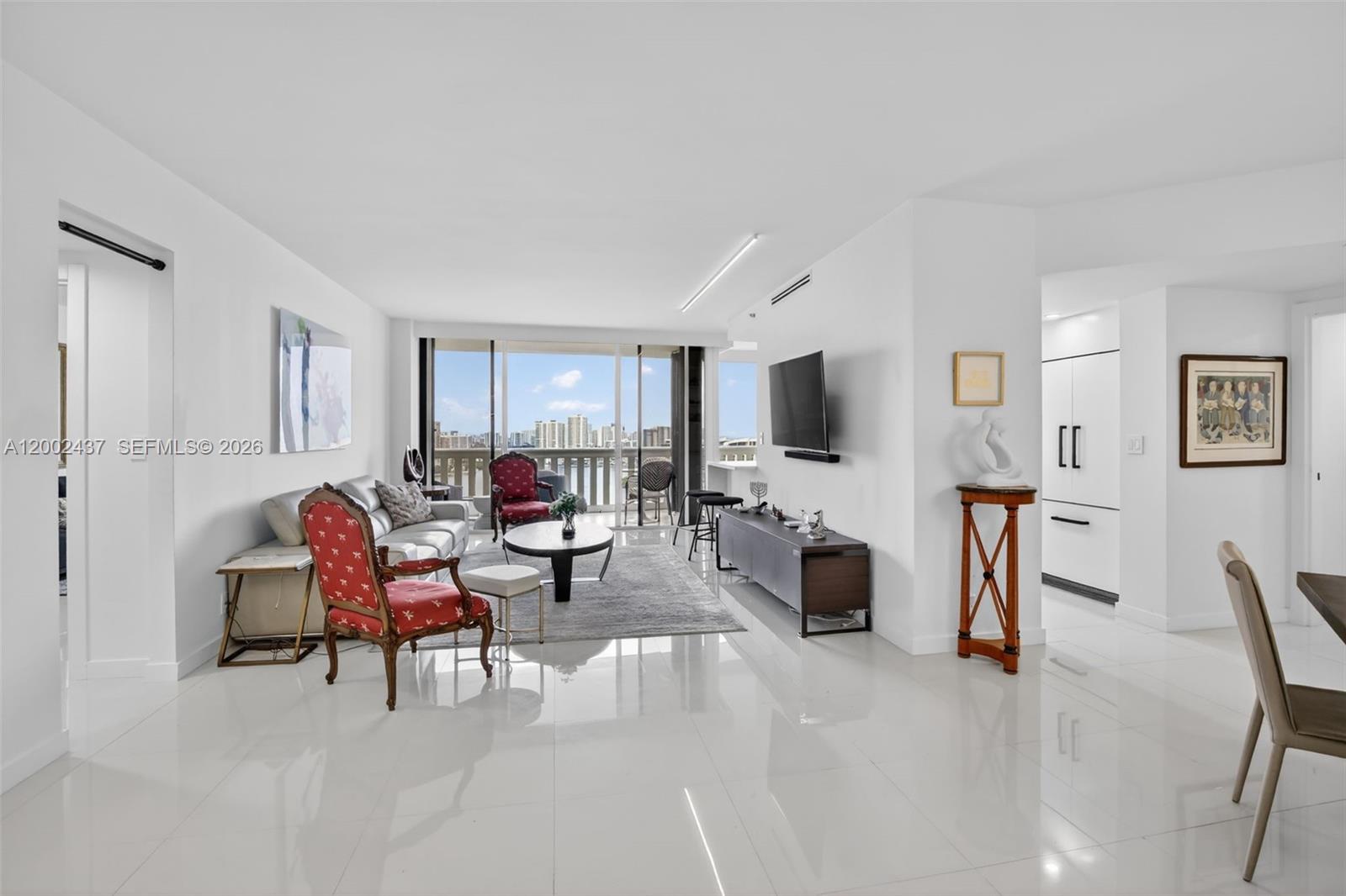 Enjoy Elevated Waterfront Living In This Fully Remodeled 2-Bedroom, 2-Bath Residence Offering Breathtaking Intracoastal And Ocean Views. Thoughtfully Designed By A Renowned New York Designer, This 1,607 Sq. Ft. Condo Showcases A Refined Split-Bedroom Layout And A Seamless Blend Of Style And Function. The Open-Concept Kitchen Is Outfitted With Premium Fisher & Paykel Appliances And Flows Effortlessly Into Elegant Living And Dining Spaces. Features Include Sleek Porcelain Flooring, Custom Closets, High-End Electric Shades, And A Spacious Primary Suite Complete With A Miele Washer And Dryer And A Spa-Inspired Bath Featuring Top-Tier Finishes And An Oversized Walk-In Shower. Enjoy The Williams Island Lifestyle With World-Class Amenities Including 14 Tennis Courts, 4 Pickleball Courts, 2 Padel Courts, 3 Restaurants, A State-Of-The-Art Spa, Marina, Walk/Jog Path, Kids Playground, Basketball Court, Soccer Field, Putting Green, Courtesy Bus, Plus A Gourmet Sundry Coffee & Gelato Shop And More.