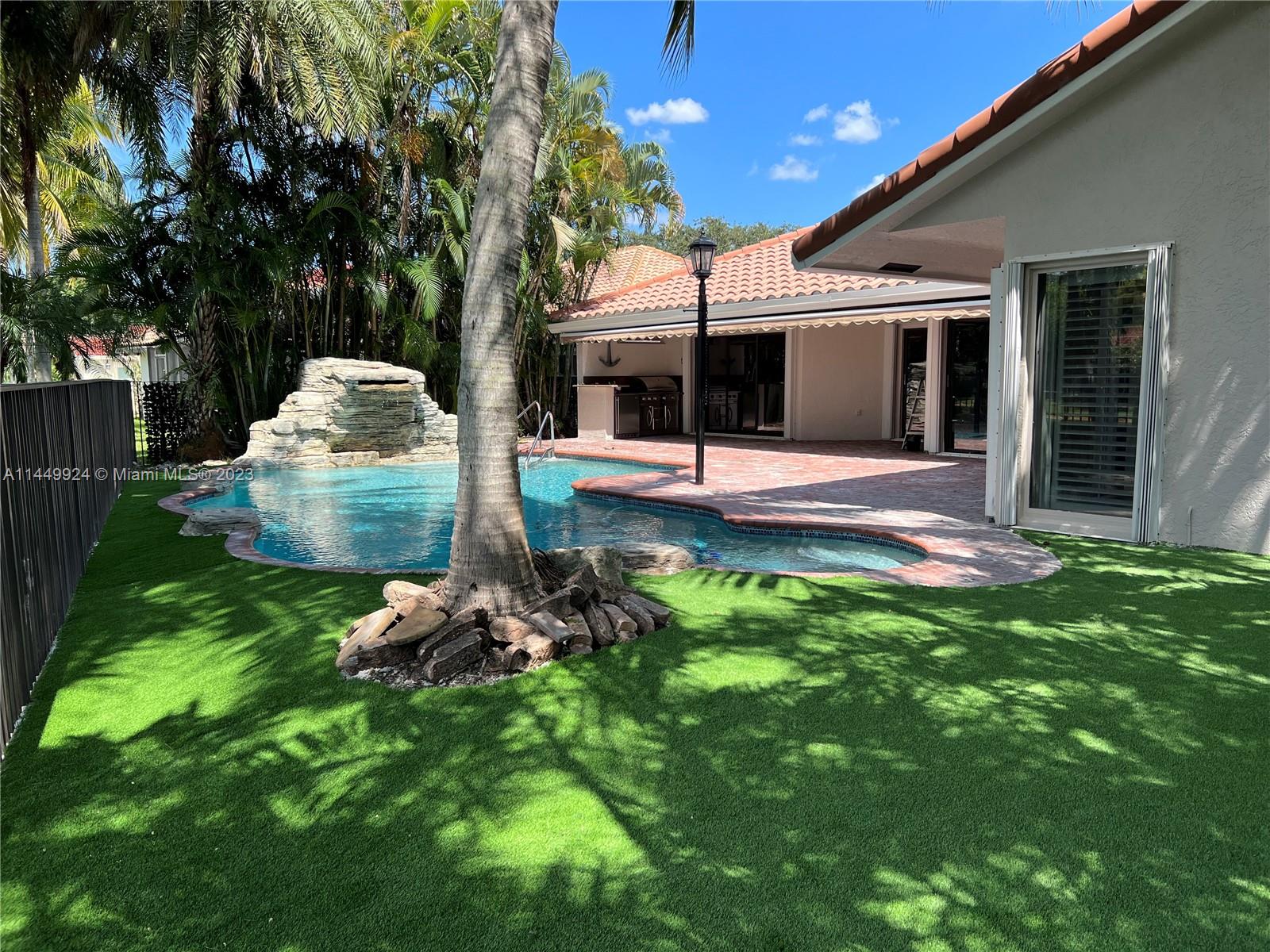Inviting and cozy single-family home on an oak-lined street, featuring 4 bedrooms and 2.5 bathrooms. The living spaces have wood floors, bathrooms have marble flooring. Stainless steel appliances. The backyard offers a serene canal view and a resort-style pool, making it a perfect setting for gatherings. Located in the sought-after Sunset Springs community in Weston, this gated enclave is comprised of only 189 homes. Within the community, you'll find a children's park, tennis court, and basketball courts. Notable highlights encompass accordion hurricane shutters and a 2-car garage. This residence is zoned for Indian Trace Elementary, Tequesta Trace Middle School, and Cypress Bay High School, guaranteeing a top-tier education. Easy to show.