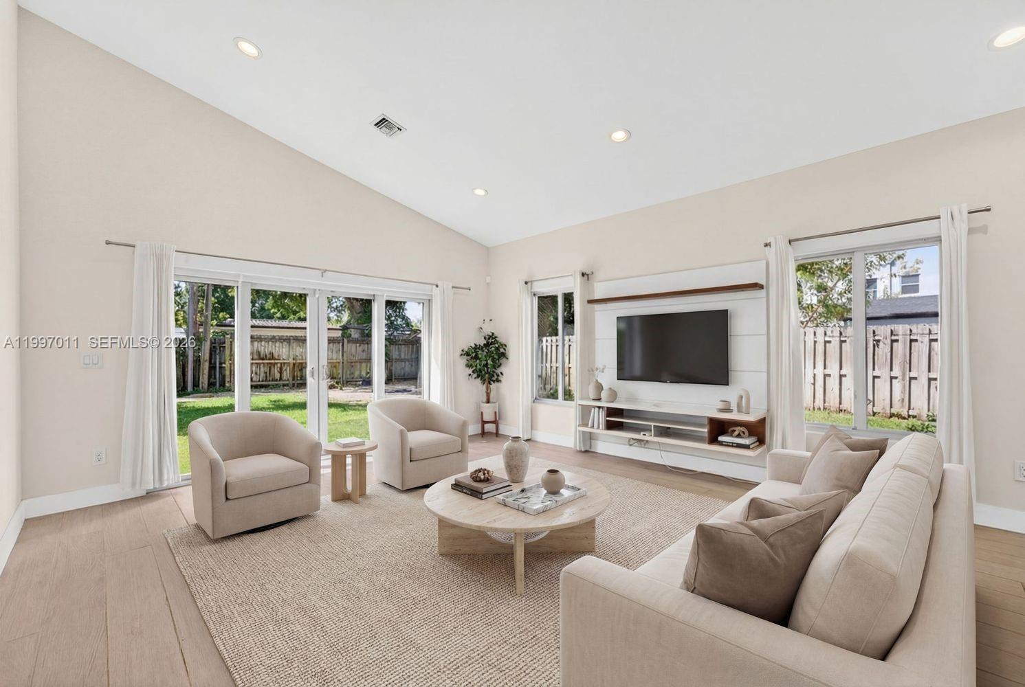 Welcome to this beautiful 3-bedroom, 2-bathroom home offering modern upgrades, an open layout, and an unbeatable Fort Lauderdale location. Featuring high ceilings and abundant natural light, the home feels bright, spacious, and inviting from the moment you walk in. The thoughtfully designed open floor plan showcases luxury vinyl flooring throughout, updated PVC plumbing, a tankless water heater, and impact windows and doors for peace of mind and energy efficiency. The spacious primary suite features a large walk-in closet, while the additional bedrooms offer flexibility for family, guests, or a home office. The property also features a large, fully fenced backyard—perfect for entertaining, pets, or future additions like a pool—along with a storage shed for added convenience. The 1-car garage provides additional storage and functionality. Located in a prime Fort Lauderdale location, this home is just minutes from popular waterfront dining, shopping centers, Las Olas Boulevard, Fort Lauderdale-Hollywood International Airport, and the beautiful South Florida beaches. This move-in-ready home combines modern upgrades, location, and lifestyle—a rare opportunity you won’t want to miss.