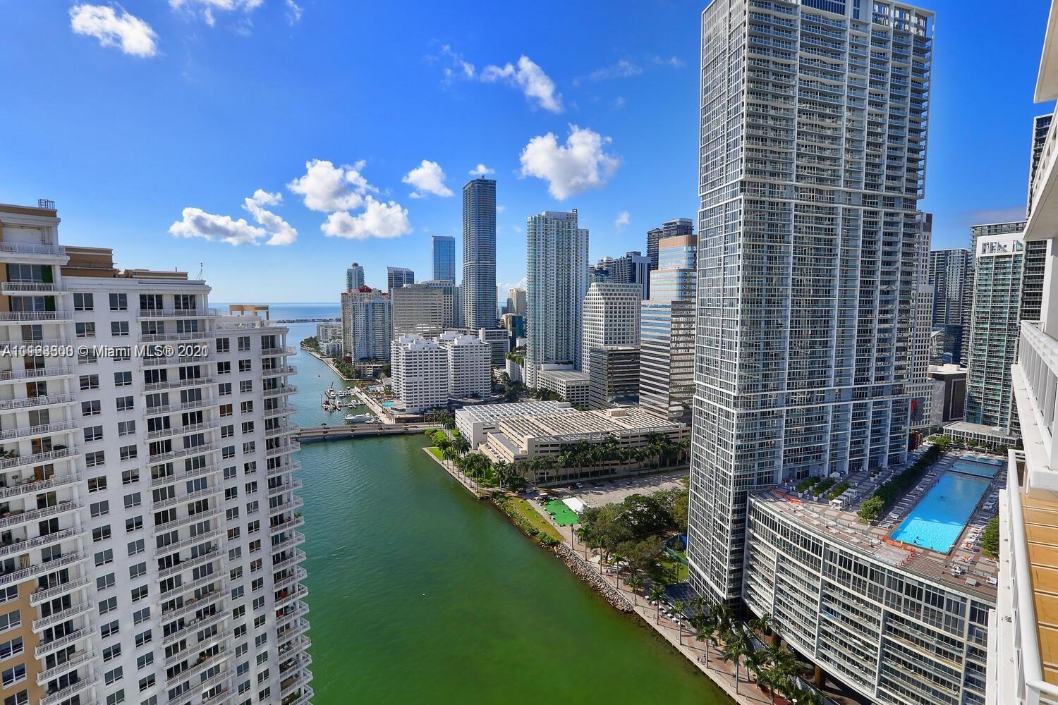 Breathtaking Biscayne Bay and City skyline views from this spacious 33rd
floor 1b/1.5b apt. Over 1000 s.f of open floor plan and 10+ ft CEILINGS!.
Kitchen features Italian cabinetry, granite countertops, Sub-Zero
refrigerator & Miele induction range, dishwasher and wine cooler. Recessed
lighting and Alexa controlled "smart" lighting in LR & bedroom. electric
shades in bedroom. Marble floors throughout. Spacious walk-in closet.
Samsung "app controlled" washer & dryer inside unit. Private storage unit
on 3rd level. Amenities include: Pool and spa, gym, tennis & racquetball
courts, kids play area, bicycle storage and 24 hr security. Walking
distance to Brickell City Centre, vibrant Brickell Avenue & Downtown.
Minutes away from MIA, South Beach, Coconut Grove & Coral Gables.