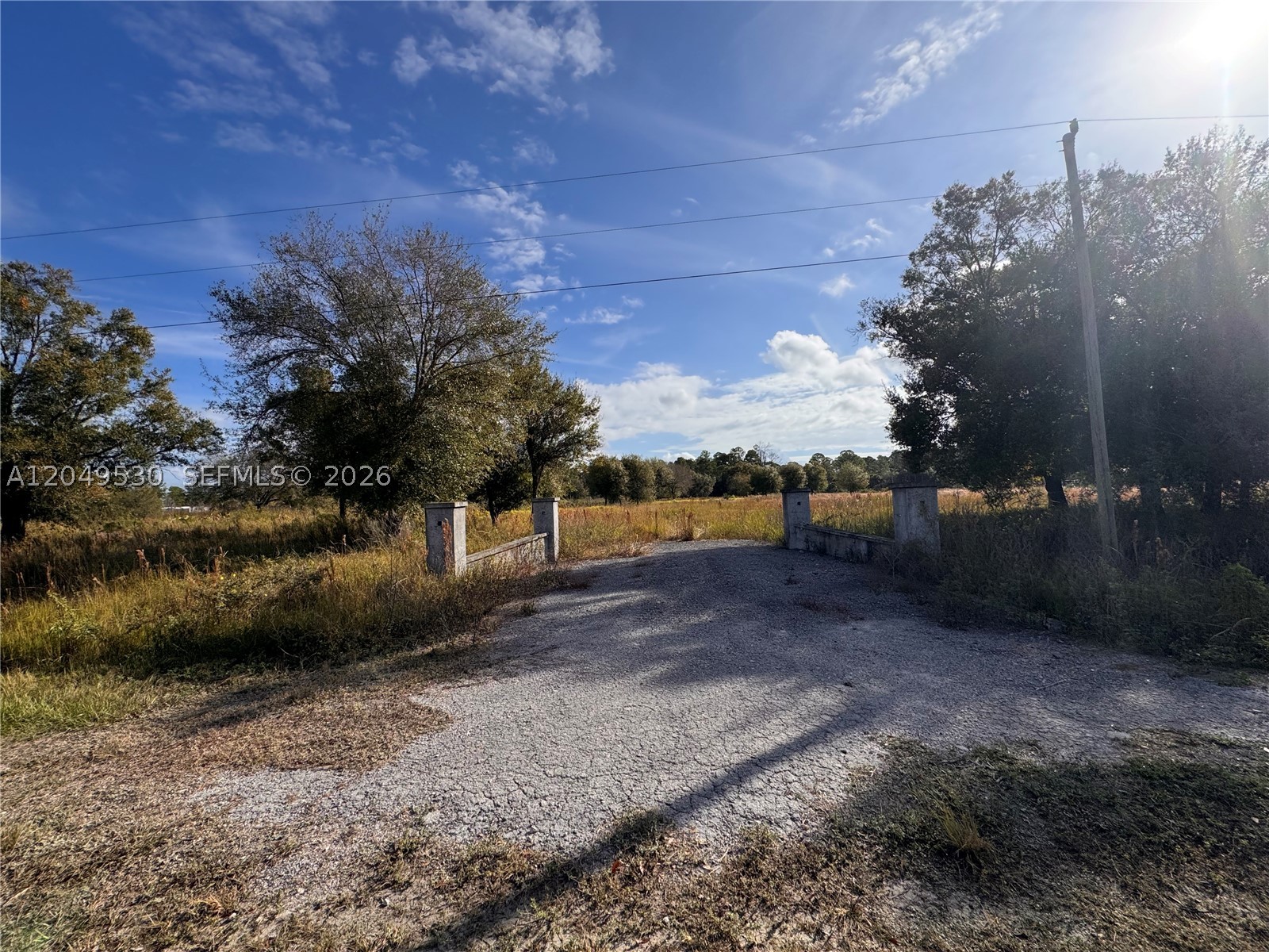 7.5± acres in Montura Ranches — five platted tracts (Tracts 3739, 3740, 3750, 3751, 3752) under one folio: one 2.5-acre tract plus four 1.25-acre tracts. Keep it whole as a private ranch estate, or explore splitting for individual sale/build — buyer to verify current tract configuration, zoning, and subdivision process with Hendry County. High and dry, cleared open pasture, gated entrance, limerock road frontage. No-HOA-fee area. Minutes from Clewiston. Seller motivated — bring all offers.