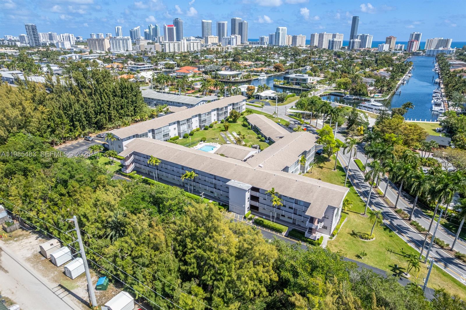 Beautifully updated 1BR/1BA first floor residence located in the desirable gated community of Golden Isles in Hallandale Beach! This freshly painted unit has a bright and open layout with tile flooring throughout. New light fixtures and plenty of storage. Updated bathroom with a modern vanity, wood cabinet and quartz countertop. Enjoy a spacious living and dining area, ample closet space, and a screened-in patio perfect for relaxing. Laundry room and mailbox conveniently located just down the hall. The community offers several amenities including a pool, clubhouse, outdoor shower, shuffleboard, BBQ area, and guest parking. One assigned parking space is included, and water is covered in the rent for added convenience. Ideally situated in a quiet, safe neighborhood surrounded by million-dollar homes, this property offers an excellent location just minutes from the beach, shopping, dining, and major roadways.