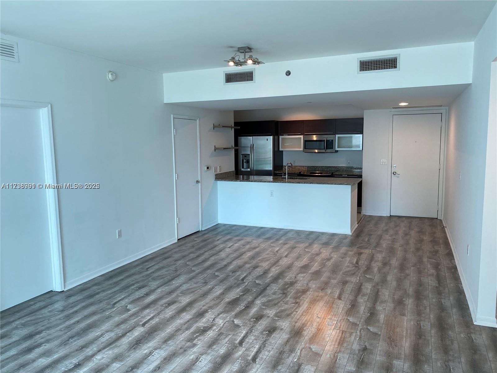 THE PLAZA 901 BRICKELL CO - Residential Lease
