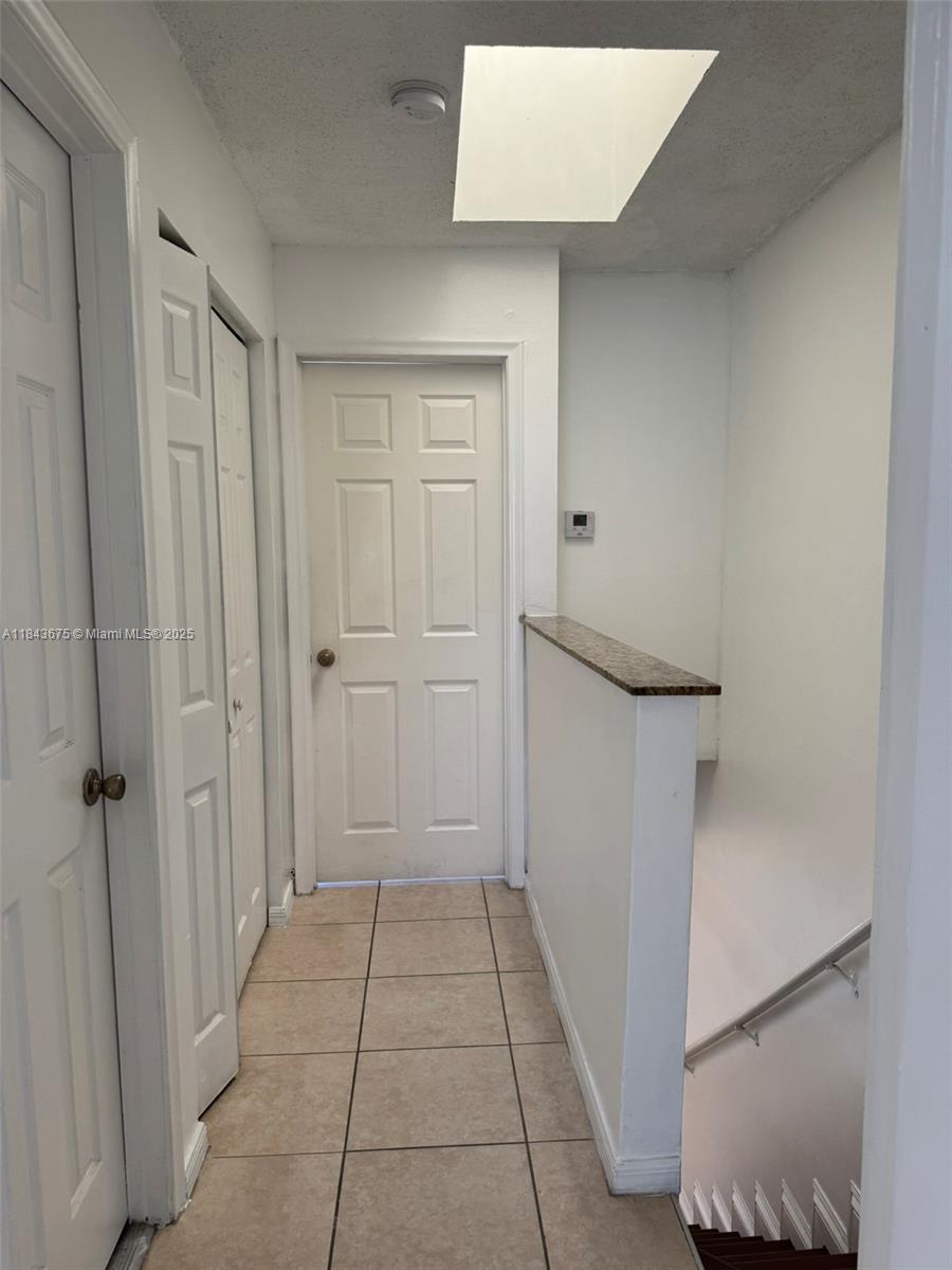 SECOND WEST LAKE CONDO - Residential Lease
