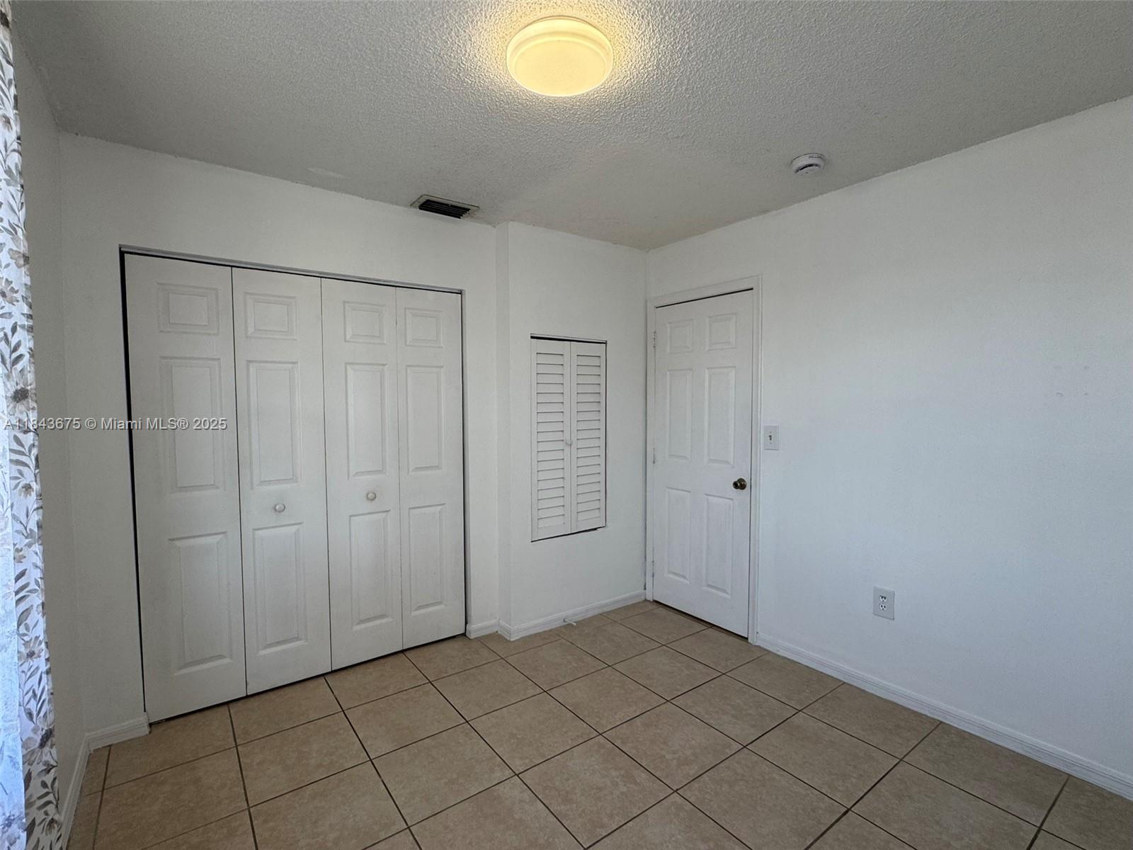 SECOND WEST LAKE CONDO - Residential Lease