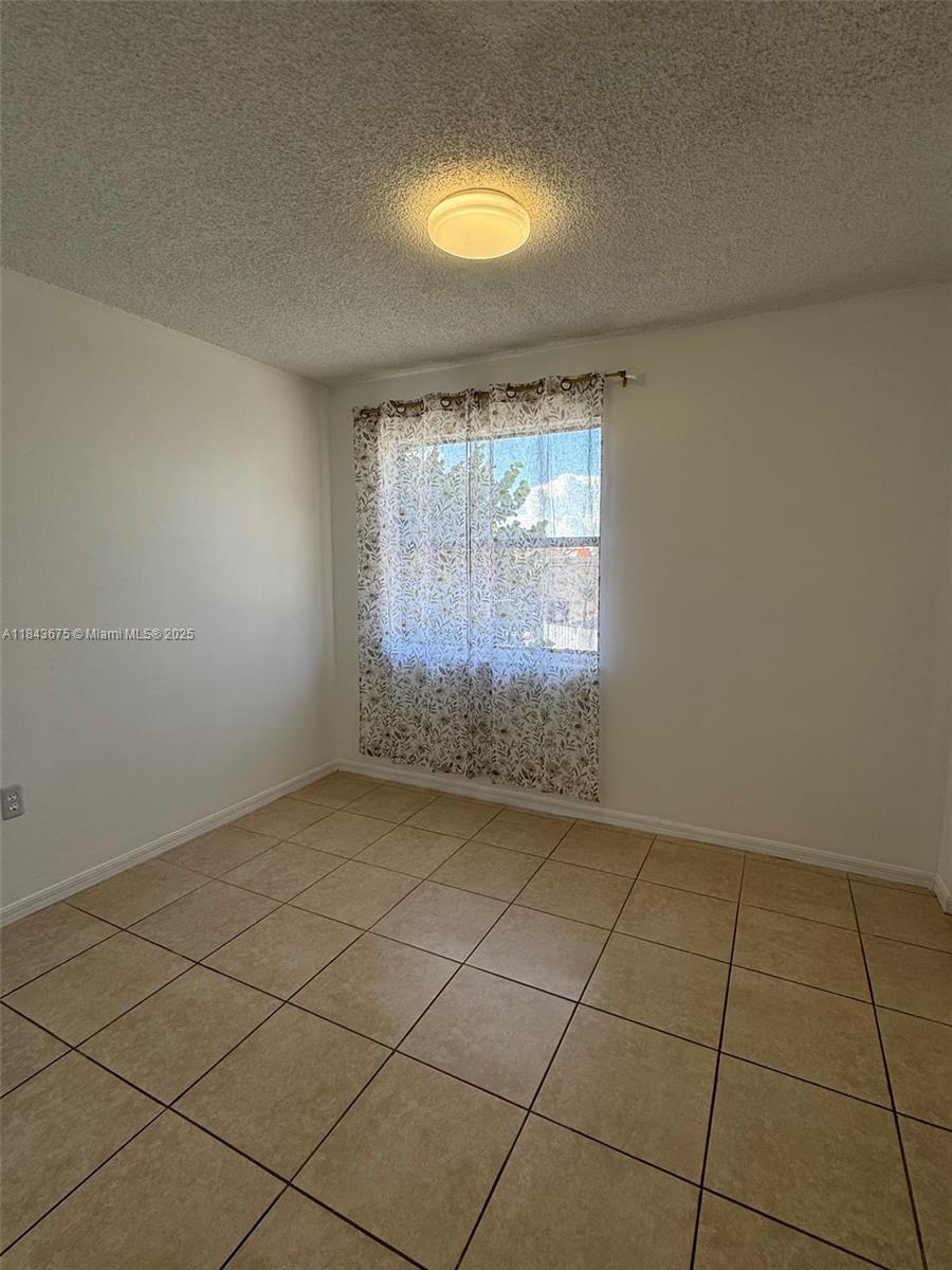 SECOND WEST LAKE CONDO - Residential Lease