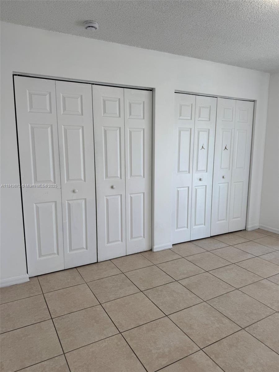 SECOND WEST LAKE CONDO - Residential Lease