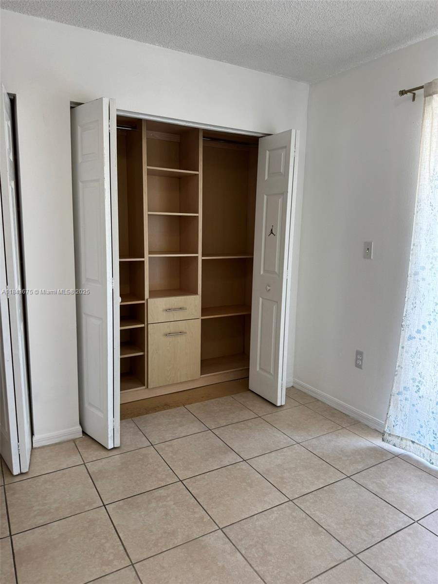 SECOND WEST LAKE CONDO - Residential Lease