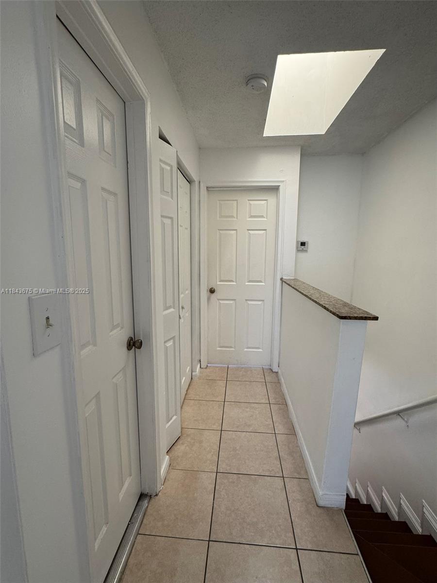 SECOND WEST LAKE CONDO - Residential Lease