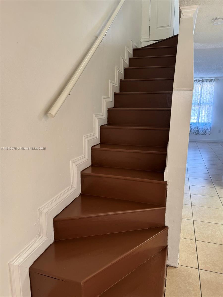 SECOND WEST LAKE CONDO - Residential Lease