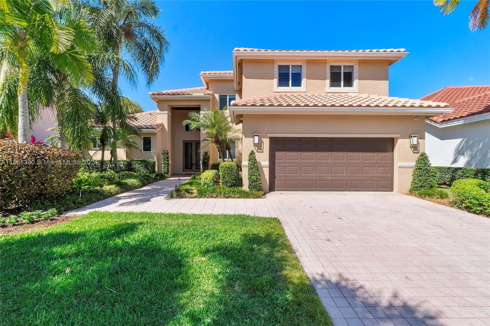 Beautiful and warm custom-built home in the highly desired and sought after “The Pointe” at Weston Hills. This well updated residence offers: 5-bedrooms, 4-bath (including cabana bath), real hardwood flooring/tile combination, quartz kitchen countertops, Sub-Zero and Wolf stainless-steel appliances, Dual sinks and Roman tub in master room, Hunter Douglas custom blinds, Wine Cooler + Fridge, Liquid Fire custom fireplace, hurricane impact windows throughout the house, Front-loading LG Washer & Dryer, Alarm system ready and much more… Relax and enjoy our South Florida weather in your own Salt water pool with stunning lake views on a marble decking.