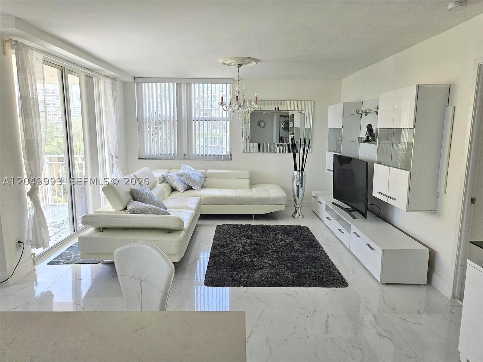 INTERCOSTAL AND CITY VIEWS! FURNISHED! 1 ASSIGNED PARKING SPACE! CORNER UNIT IN BRICKEL KEY ISLAND. Features ceramic flooring throughout. Open kitchen layout with a cooking island and top-of-the-line appliances. Master bedroom with built-in shelving and master bath en-suite with a combination tub and shower. Walk-in closet. WASHER AND DRYER INSIDE THE UNIT. Building amenities include a pool, gym with water view, business center, clubroom, valet, and 24-hour security. CENTRALLY LOCATED within walking distance from Equinox gyms, Whole Foods, major banks, and Publix supermarkets. Near Brickell City Center, it features designer stores, restaurants, and nightlife entertainment.