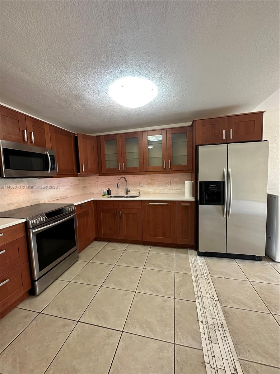 DORAL GARDENS II CONDO - Residential Lease