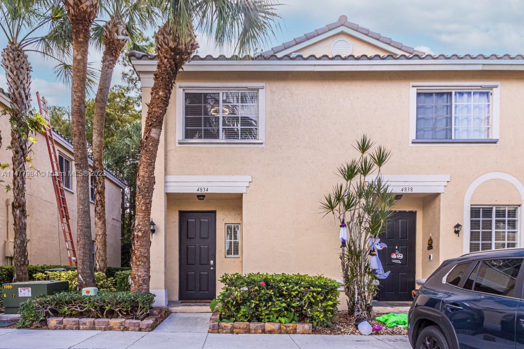 This 3BR/2.5BA Townhome has it all – A brand new roof. The upgraded kitchen has all brand-new stainless-steel appliances. All 3bathrooms have been upgraded. All the popcorn ceilings have been removed and replaced with modern skim-coat ceilings. New air A/C system. The primary bedroom has an en suite bathroom. The entire house has tiled flooring throughout. LED lighting and ceiling fans. Washer & Dryer are brand new.  The backyard overlooks a peaceful natural preserve. 2 parking spots. Victoria Isles is a gated community which has a beautiful clubhouse and a large pool with a low HOA fee ($372) pets permitted. No buyer approval needed. Excellent schools. This home is located close to the Coconut Creek Promenade, shopping, restaurants, and major highways. This home is priced to sell.