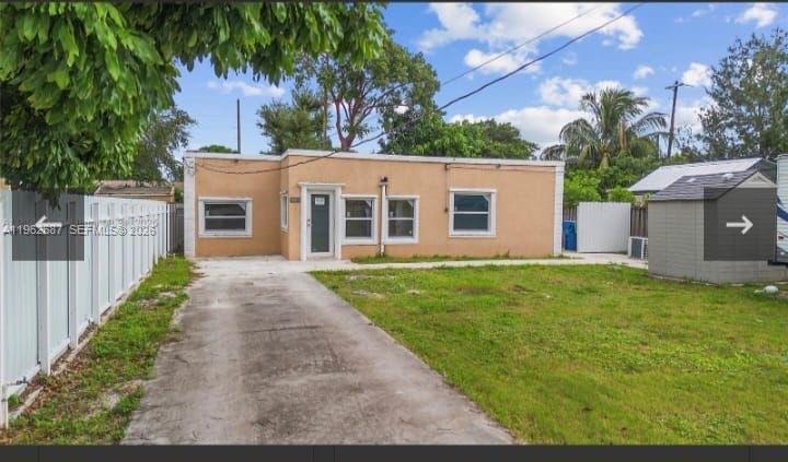 Centrally located 3/1 spacious home. This home features impacy windows, 4 year old roof, fence. Perfect for investors or Ideal for a variety of living arrangements.  Nice covered terrace with counter/kitchen space ideal for entertaining.Plenty of parking.