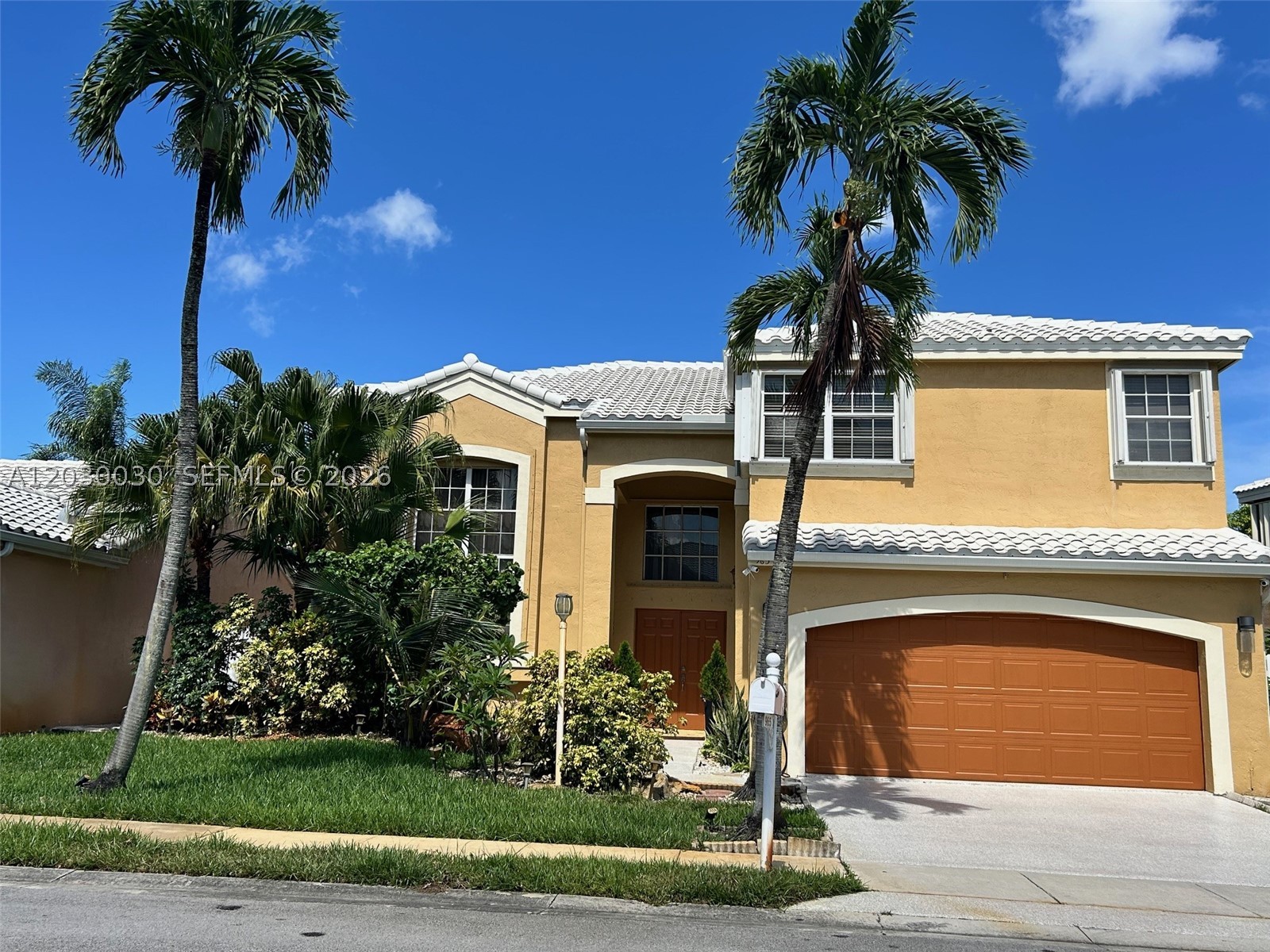 Experience refined living in this exquisitely renovated 4-bedroom, 3-bath residence in The Landings, one of Pembroke Pines’ most coveted guard-gated communities. Surrounded by beautifully maintained homes and mature landscaping, this exceptional property also benefits from an attractively low association fee of just $120 per month. The expansive family room, spacious kitchen breakfast area, and formal dining room are all oriented to capture enchanting views of the large in-ground pool, framed by an exotic flowering garden and stately palm trees. All four bedrooms are ideally situated on the second floor, while a full bath on the main level offers added convenience for guests and poolside entertaining. A private first-floor office provides a quiet and practical space for working from home. Outdoors, the backyard unfolds like a secluded tropical sanctuary, complete with lush landscaping, exotic blooms, fruit trees, and generous green space for relaxation and entertaining in total privacy. Inside, the home showcases beautifully upgraded kitchen and baths, updated flooring, newer A/C units, a newer water heater, and a newer roof replaced in 2020. The primary bath offers a spa-like escape, highlighted by a 12-jet heated Jacuzzi designed for ultimate relaxation. There is a small 10 x 10 shed located outside for additional storage space. The home is also electrically pre-wired to conveniently plug your generator externally to power the entire home when needed.