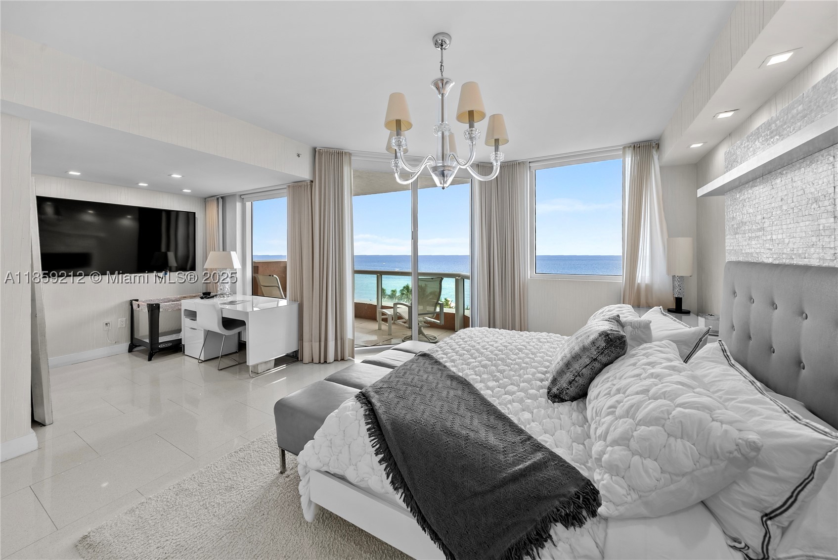 Priced to sell!! 
Spectacular residence at the world-renowned Acqualina Resort. This home offers breathtaking sunrise ocean views from two spacious private terraces. Floor-to-ceiling windows fill the home with natural light, highlighting elegant finishes and an open layout ideal for relaxing or entertaining. Enjoy 5-star amenities: 3 oceanfront pools, beach service, 3 restaurants, spa, concierge, and unmatched staff. Private lobby entrance ensures enhanced privacy.