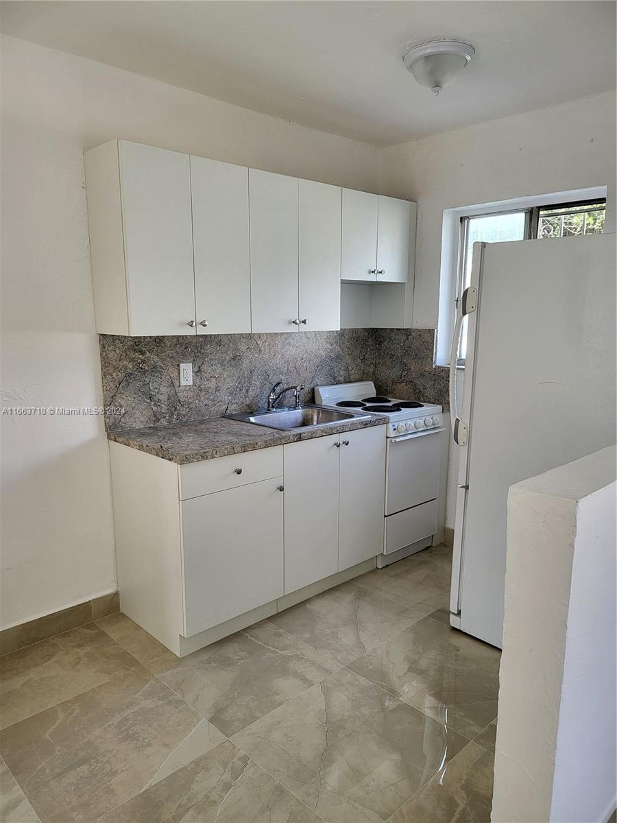 CRAVATTS ALLAPATTAH HOMES - Residential Lease
