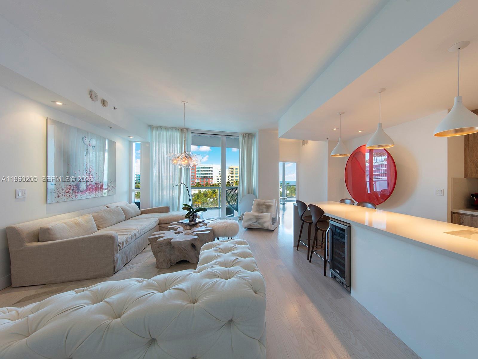 Contemporary renovation in this split 2 bed, 2.5 baths floor plan. Tastefully designed and decorated seamlessly merging the open sleek kitchen with an inviting living area. Private elevator foyer, 10’ ceilings, 2 balconies. Indulge in the most luxurious resort-style beachfront 13 acres of amenities such as 2 lagoon-shaped pools, lap pool, beach service, 3 clay tennis courts with a Pro-Shop, oceanside private restaurant, gym/spa, concierge, valet and security