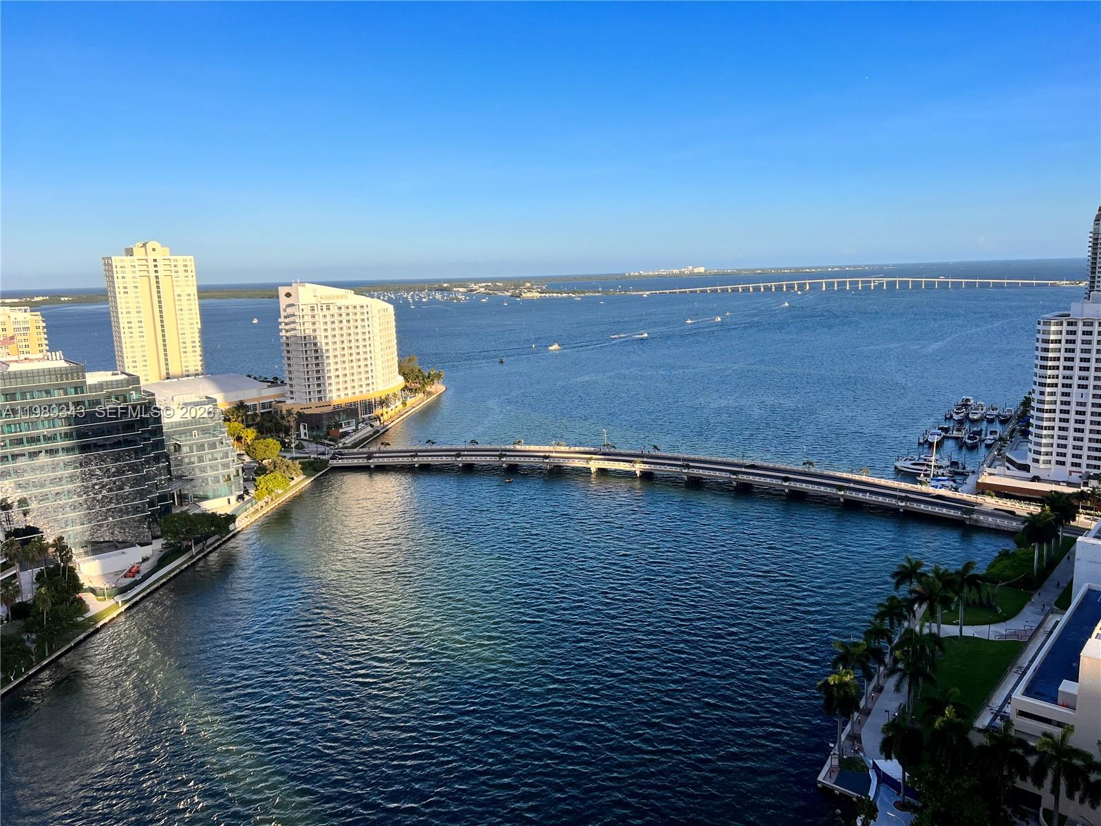 Enjoy stunning Direct Unobstructed water views from this 3/2 corner unit with Carbonized bamboo floors throughout (NO CARPET), open Italian kitchen, S. Steel Appliances (SUB-ZERO, miele), Marble tops in kitchen & bathrooms, custom closets, frameless Shower enclosures and LINEN BLACK OUT CURTAINS in all Bedrooms; Roller shades in Living / Dinning areas. TWO ASSIGNED SELF-PARKING SPACES INCLUDED! State of the Art Spa, Gym and BRAND NEW GOLF SIMULATOR. NYC's H CIPRIANI & Mexican "CANTINA LA 20" Restaurants in complex. Walk to banks, offices, restaurants, shopping centers (BRICKELL Citicentre & Mary Brickell Village) just to name a few. PLZ NOTE: TENANT OCCUPIED THROUGH Apr/14/26. Buyer needs to honor the Lease, no kick-out clause in place. MUST GIVE 24 HRS NOTICE PLZ to show/see.