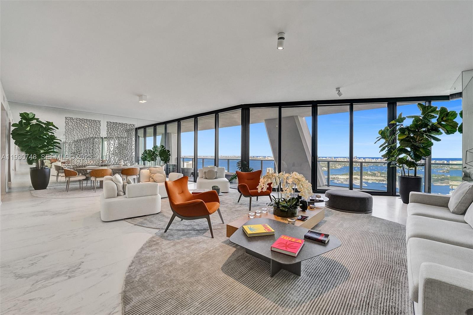 Welcome to the home of your dreams at One Thousand Museum, the iconic residential masterpiece designed by world-renowned architect Zaha Hadid. This expansive 4-bedroom, 5.5-bathroom corner residence offers a rare flow-through layout and is fully furnished by Artefacto, blending timeless elegance with contemporary sophistication.

Enjoy breathtaking intracoastal and Biscayne Bay views from every room, with endless sunrises and sunsets that frame the Miami skyline and waterfront. Spanning approximately 4,600 square feet, this residence delivers an exceptional sense of scale, light, and privacy, making it ideal for both everyday living and grand entertaining. The thoughtfully designed layout provides seamless transitions between formal and informal living spaces, while floor-to-ceiling windows flood the home with natural light.

The residence has been impeccably maintained and reflects the highest standards of luxury living. The gourmet kitchen is equipped with top-of-the-line Gaggenau and Sub-Zero appliances, custom cabinetry, and premium finishes, complemented by a state-of-the-art home automation system.

Additional features include four parking spaces, a private storage unit, and a dedicated vault, offering both convenience and enhanced security—rare and highly desirable amenities in a residence of this caliber.

This is a rare opportunity to own a truly iconic home within one of Miami’s most celebrated architectural landmarks.