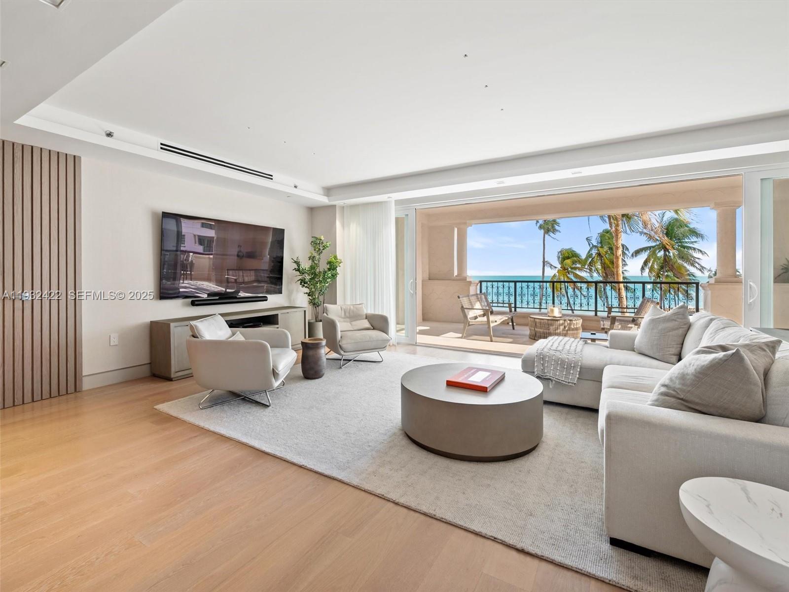 Step into the exclusive lifestyle of Fisher Island. This newly renovated and expanded residence offers 3 bedrooms, 3.5 bathrooms, and 2,656 SF of impeccably designed interior space with direct ocean views. Offered fully furnished, this smart home features a gourmet kitchen with porcelain waterfall countertops, top-of-the-line Gaggenau appliances, and custom Ornare cabinetry and closets. Listone Giordano wood flooring and bespoke millwork elevate the refined interiors throughout. Just steps from the beach, this exceptional residence delivers the ultimate Fisher Island lifestyle of design and elegance. Enjoy one of the most exclusive communities in the U.S., offering world-class amenities including golf, tennis, beach club, marinas, spa, and more.