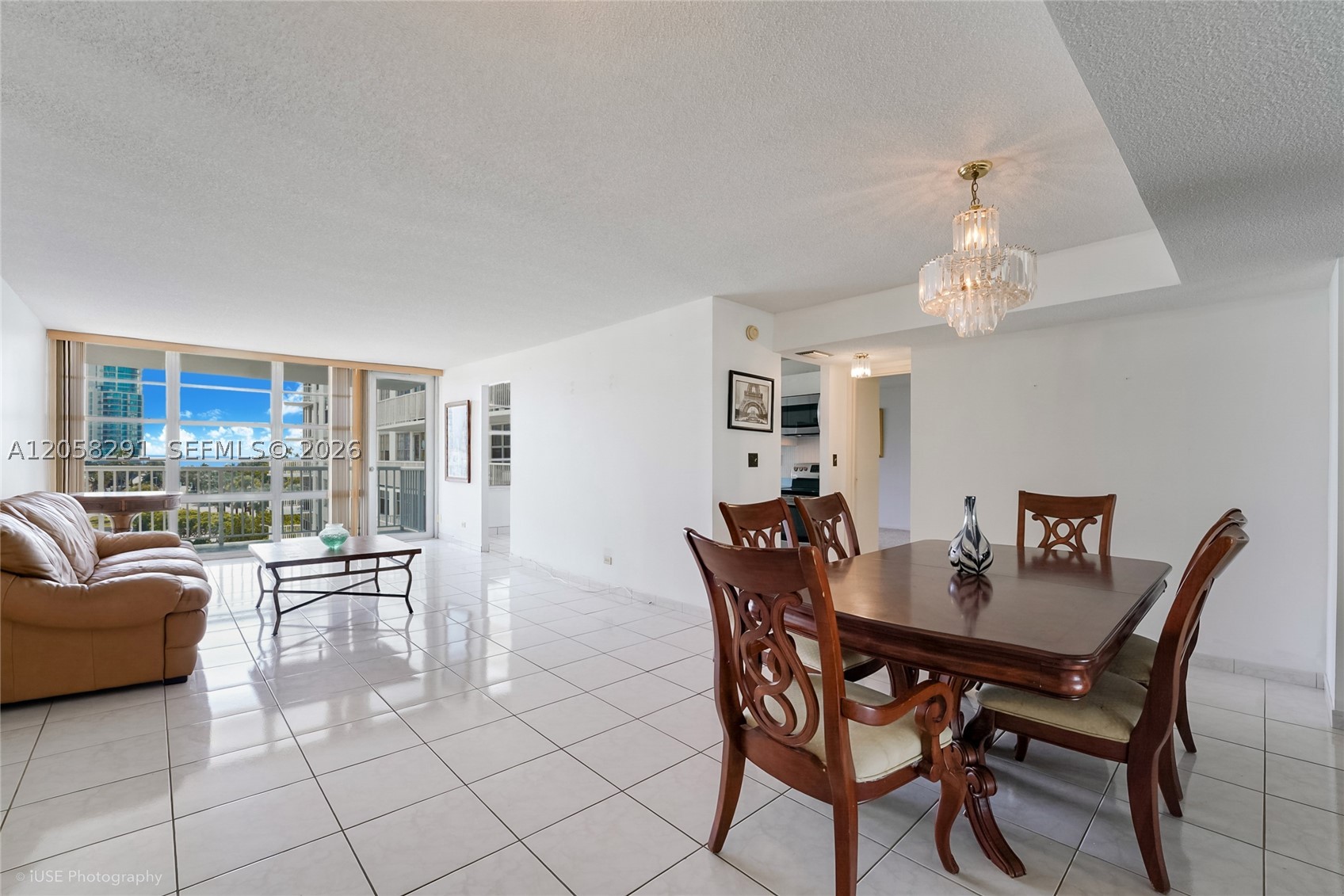This bright and expansive 2-bedroom, 2-bath residence offers nearly 1,500 square feet—a rarity at this price point—featuring a split-bedroom layout ideal for privacy when hosting family and guests. Oversized windows flood the home with natural light, creating an open, airy feel that’s hard to find under $400,000 Located directly across from the pristine beaches of Sunny Isles Beach, this is your opportunity to enjoy a true coastal lifestyle without the oceanfront price tag. At just $385,000, the value is undeniable—especially with a building that has already completed major upgrades including a new roof, new elevators, and a fully restored exterior. The transformation continues with a stunning new pool deck set to debut this May, elevating both lifestyle and long-term value. Whether you're seeking a winter escape, a smart investment, or a permanent move to sunshine, this is one of the most compelling entry points into the Sunny Isles market today.