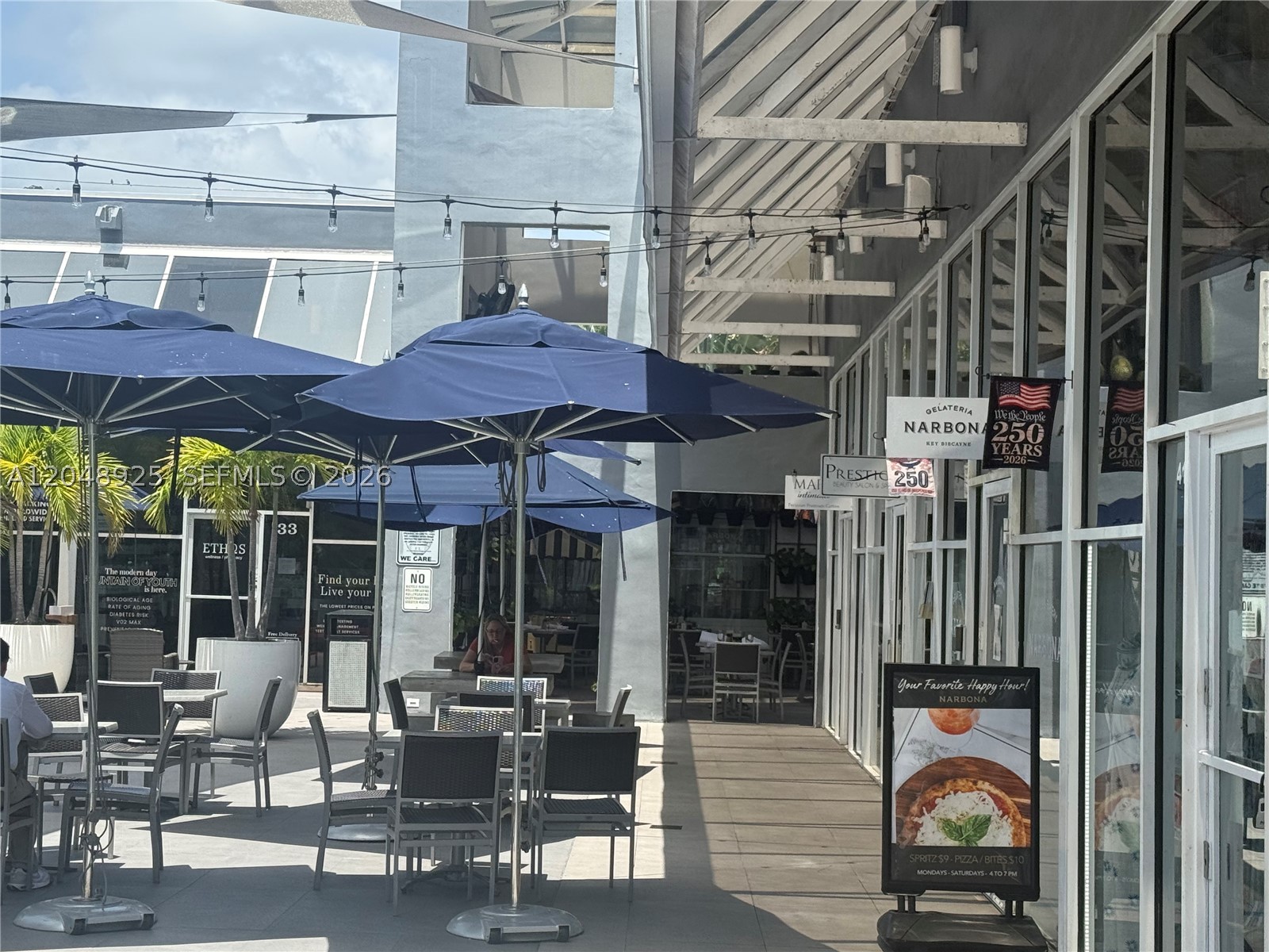 Investment opportunity to acquire a fully leased retail unit at The Square, one of Key Biscayne’s most established commercial centers. The property is occupied by a successful Cafe & Gelato under a NNN lease, with the tenant responsible for operating expenses, providing stable in-place income and minimal landlord obligations. Located on Crandon Boulevard, The Square is a vibrant 55-unit open-air shopping center with a diverse mix of restaurants, boutiques, salons, and professional offices.