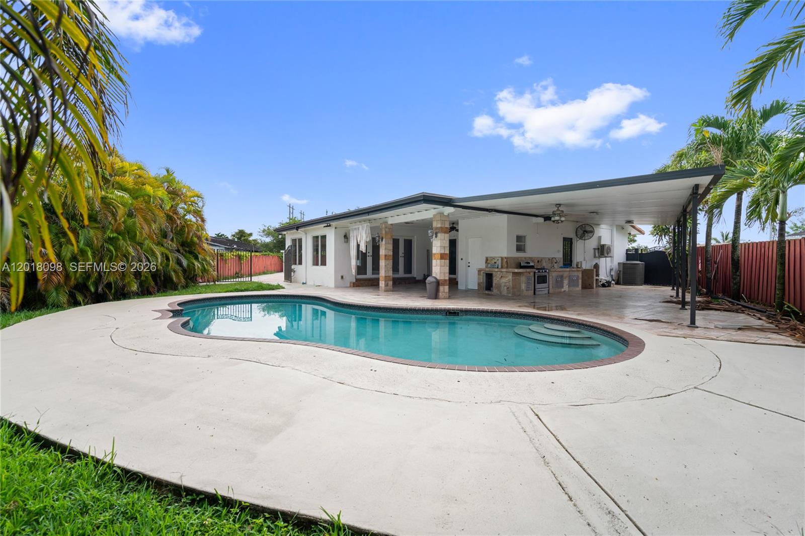 Beautifully updated 4-bedroom, 3-bath home in the heart of Kendall with a versatile converted garage, perfect for a home office, gym, playroom, or guest space. This move-in-ready property features sleek wood cabinetry, granite countertops, white porcelain tile flooring throughout, and impact windows for added safety and energy efficiency.  

Step outside to your private backyard oasis situated on an oversized 11,000+ sq ft lot featuring a sparkling pool, covered terrace, and fully equipped outdoor kitchen with sink and stone countertops — ideal for entertaining. The fully fenced yard includes a separate gated pool area plus ample space to accommodate a large boat or RV with RV hookup and sewer access already in place.  

Located in the desirable Winston Park/Kendall area near top-rated schools, shopping, dining, and major highways. A rare opportunity to own a spacious home with resort-style outdoor living and room for all your toys. No HOA approval required. Easy to​​‌​​​​‌​‌​​​‌‌​​​‌‌‌​​‌​​‌‌​​​​ show.