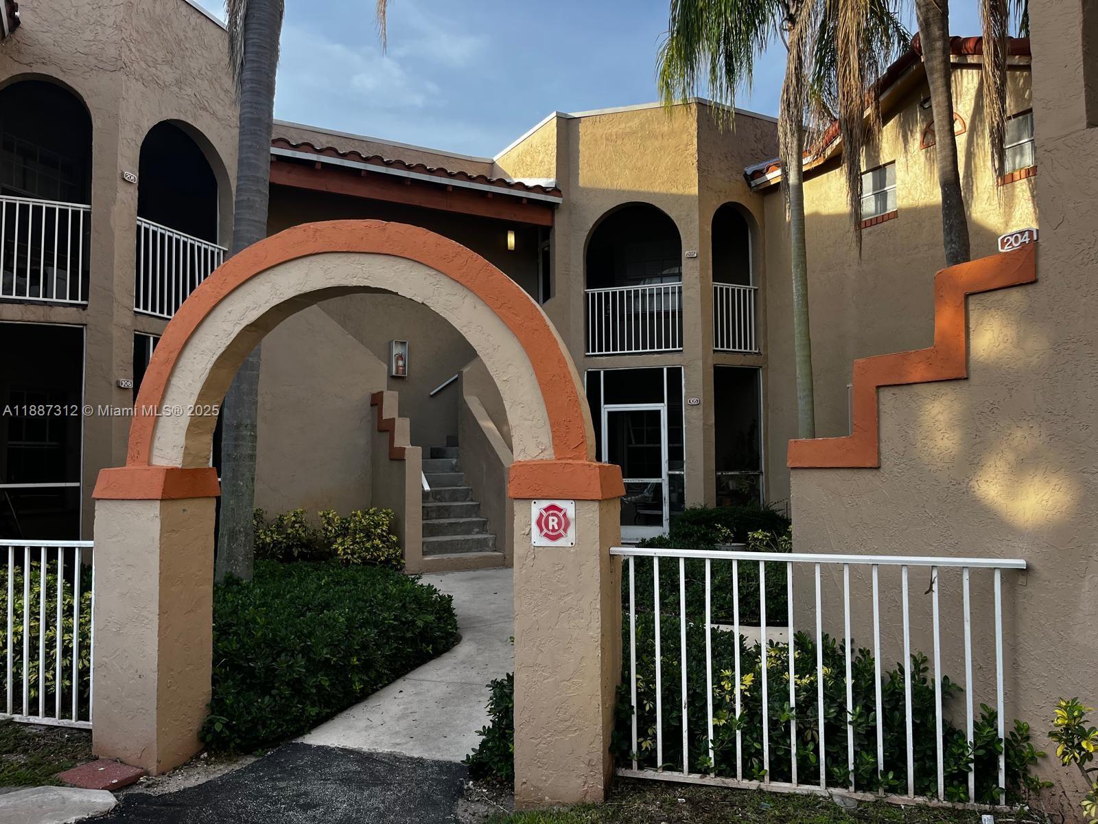 Welcome to this beautifully 2-bedroom, 2-bath Corner Unit located in the heart of Pembroke Pines. This first-floor residence features a spacious open layout filled with natural light, creating a warm and inviting atmosphere. The primary suite offers a private retreat with a walk-in closet and en-suite bath, while the second bedroom is ideal as a guest room, office, or flex space. Step out to the screened-in patio and enjoy peaceful views of lush greenery—perfect for relaxing mornings or evenings. The community provides great amenities including a pool, clubhouse, and fitness center, all within a well-kept setting. Conveniently located just minutes from shopping, dining, entertainment, and major highways, this home combines comfort, lifestyle, and accessibility. Schedule showing today!