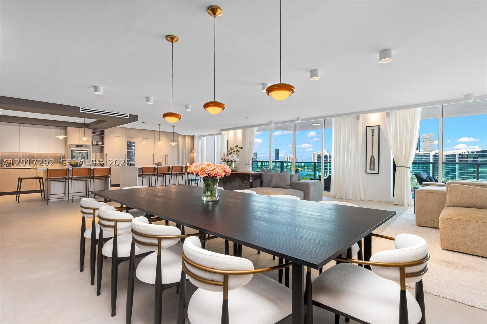 The Only One-of-One Trophy Combination Residence at Peninsula One. This bespoke renovated estate spans a massive 6,844 total SF, offering the scale of a private home with the elite luxury of Aventura’s premier waterfront tower. A true flow-through sanctuary, the residence features 6 bedrooms, 6 full baths, and 2 half baths. The heart of this home is an unmatched over 1,500 square foot Grand Entertaining Suite. This seamless environment merges a dining space, living room, and chef’s kitchen into one cohesive epicenter framed by floor-to-ceiling windows and breathtaking panoramas of the Atlantic Ocean and Dumfoundling Bay. Four balconies provide 703 SF of outdoor living for iconic sunrise and sunset views. The over 1,000 square foot Primary Wing is a masterclass in luxury. Designed as a self-contained retreat with its own balcony, this sanctuary features a boutique-inspired dressing room and spa-like bath. The floor plan includes a custom media room with refined Jade walls, a library, and a dedicated housekeeper’s suite. From exclusive-use elevator lobbies to the massive laundry suite, every detail is optimized for elite living. Residents enjoy 5-star amenities: spa, fitness center, pool, and café. A rare combination of units 1503 & 1504. An unprecedented trophy for the discerning.