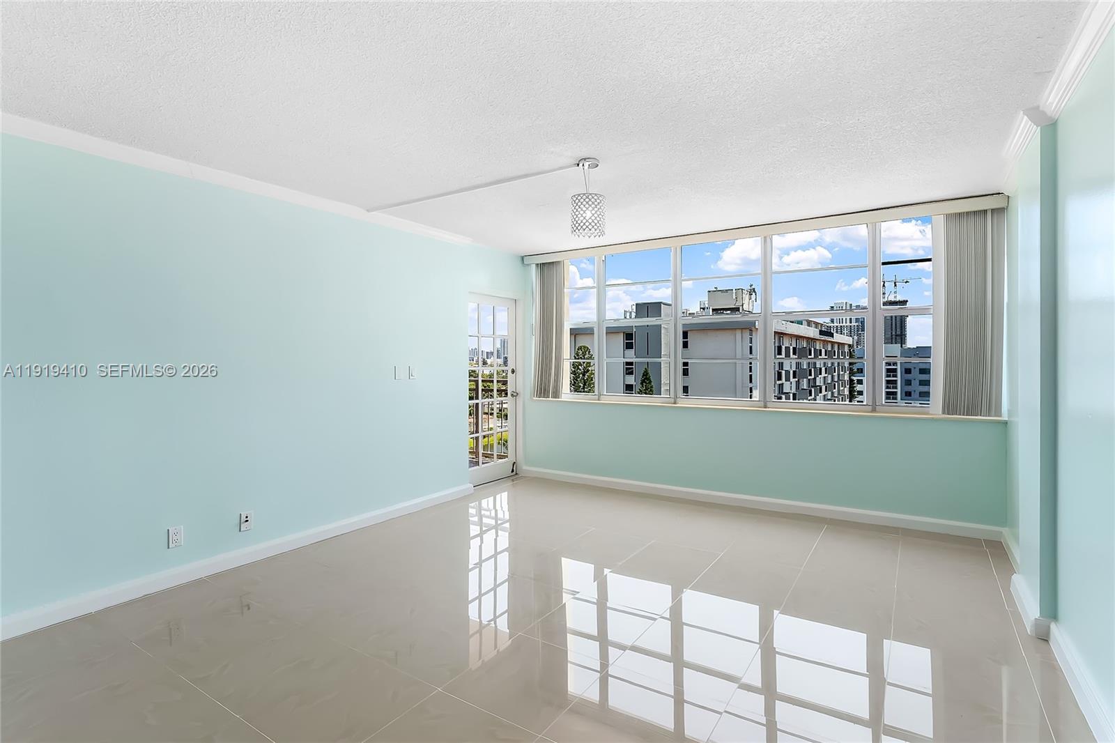 Great investment opportunity! OK to lease first year. This is your chance to own a spacious and bright 1bed/1,5bath condo with a beautiful view of the canal and the city. Tile floors thru-out.Gated community. Location is great, close to shops, beaches, parks, Aventura Mall. Building has just reopened after passing final inspections and having been certified as Safe Structure by the Miami-Dade County. To carry out the repair work, the owner paid 3 special assessments in full. The AC is almost new. The building is still undergoing renovations, but is suitable for habitation & some are already living. Great opportunity for an investor or end user.  Tenant Occupied. Lease $1450/month ends on April 31, 2027. No showings without an acceptable offer. 24 hours notice. Listing agent can send unbranded video.