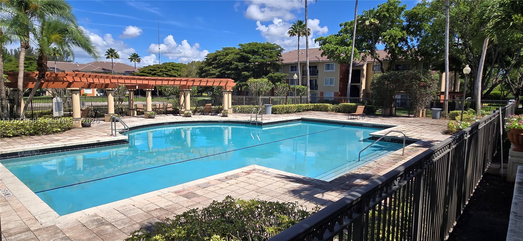 PRICED TO SELL FAST!! Step into this updated and sun-filled 2-bed, 2-baths condo, with open balcony—retreat for morning coffee. FRESHLY PAINTED!! Large bedrooms with ensuite baths, and the living room opens up to the balcony. Updated kitchen with new appliances. Quartz countertop. VAULTED CEILINGS. Washer & dryer inside the unit. AC replaced 2020 w/UV system—new thermostat. New bathtubs. HIGH IMPACT GLASS!! Situated in a gated community, it offers resort-style living with amenities such as a pool, tennis, playground, dog park, and gym. Enjoy the warmth of modern ceramic flooring throughout the apartment. MUST SEE!! With a new roof (2024). Call today to schedule your private showing. Please give 24 hours' notice! Apartment rented for $1800/month until October 2026. BUILDING HAS RESERVES!!!