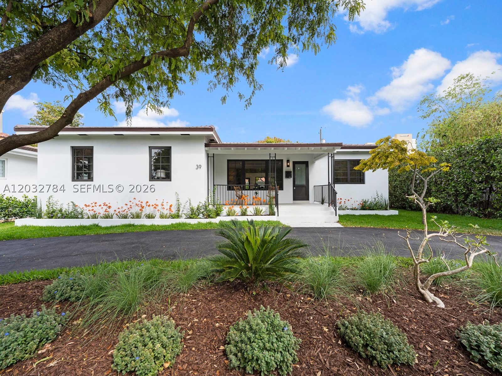 Stunning 2,653 sq. ft. remodeled home near The Plaza Coral Gables and Miracle Mile.  This home features four bedrooms, three bathrooms (two en-suites), new electrical, mechanical, PVC plumbing, brand-new roof, and impact windows/doors.  The contemporary kitchen boasts quartzite countertops and KitchenAid appliances.  New detached carport via alley road and exterior wood deck.  Experience vibrant Coral Gables living with lush greenery, dining, and shopping nearby.  Perfect for modern, stylish living.  Home is currently tenant occupied, do not disturb, appointment only.