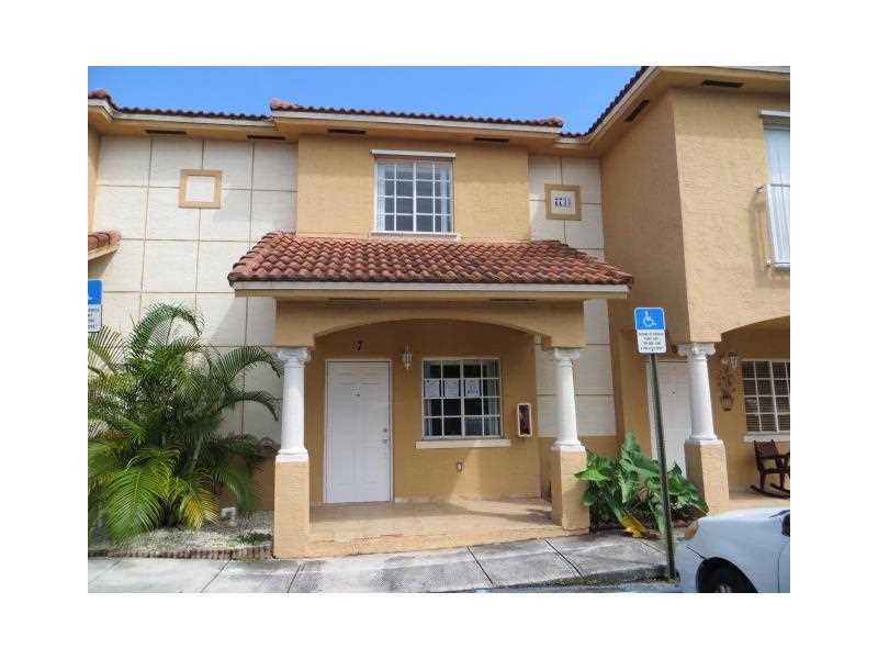 Gorgeous West Hialeah Condo 2-story style townhouse! Like new, built in "2003, featuring spacious living room, dining room, modern kitchen, 2 bedrooms, 2.5 baths, central air, ceramic tiles, fenced back yard. Centrally located near shopping, schools, park s, houses of worship, major highways.  Sold in "AS IS" condition. Much more! Won't last!