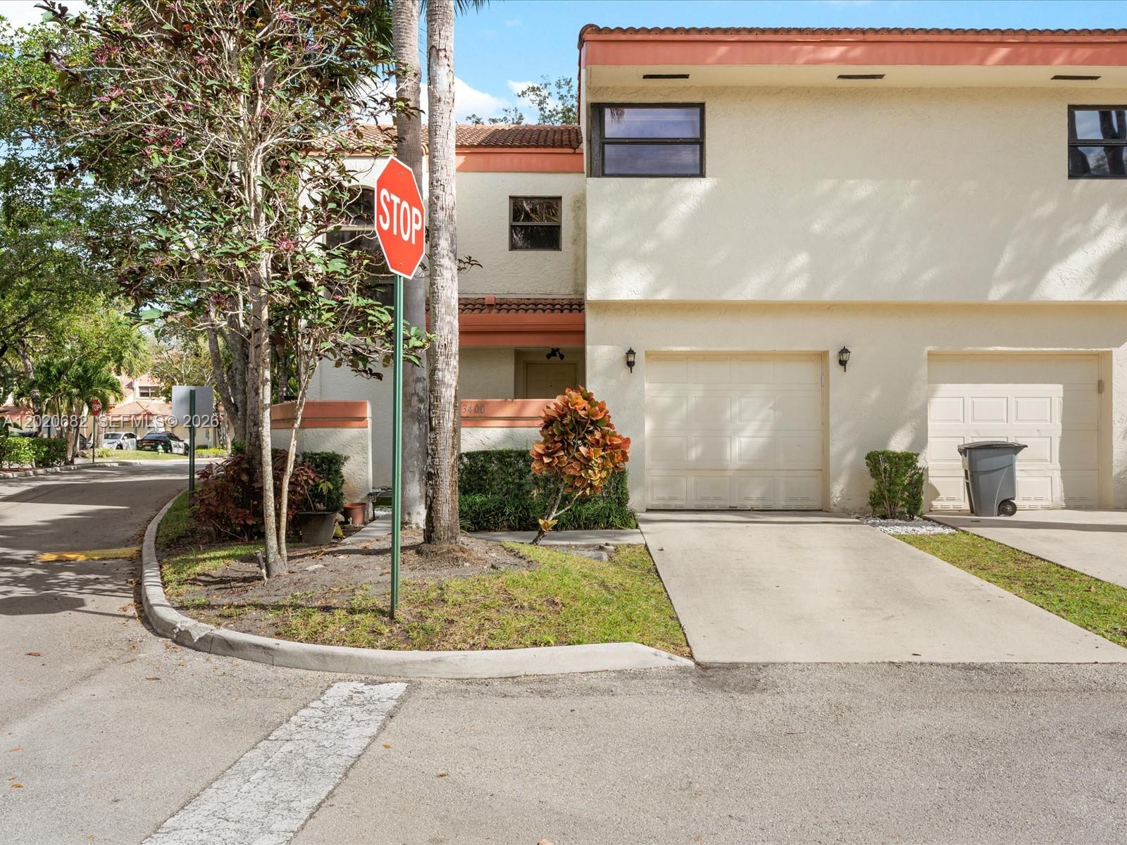 Spacious and bright 2/2.5, two-level corner unit Townhome in the desirable gated community of Emerald Oaks featuring an attached one-car garage. The open layout and cathedral ceilings provide natural light throughout this completely renovated unit - all porcelain tile on the first floor and luxury waterproof vinyl plank flooring on all of the second floor and staircase. Quality white kitchen with beautiful granite counters and stainless-steel appliances.  baseboards, smoothed ceilings and walls, designer color paint, and lighting.  toilets, tub, shower, tiles, cabinets, granite counters. Walk-In closet, ceiling fan. Screened patio. Washer/dryer hookup in the garage. Great location close to many amenities - TY Park, beaches, shopping, and major highways.