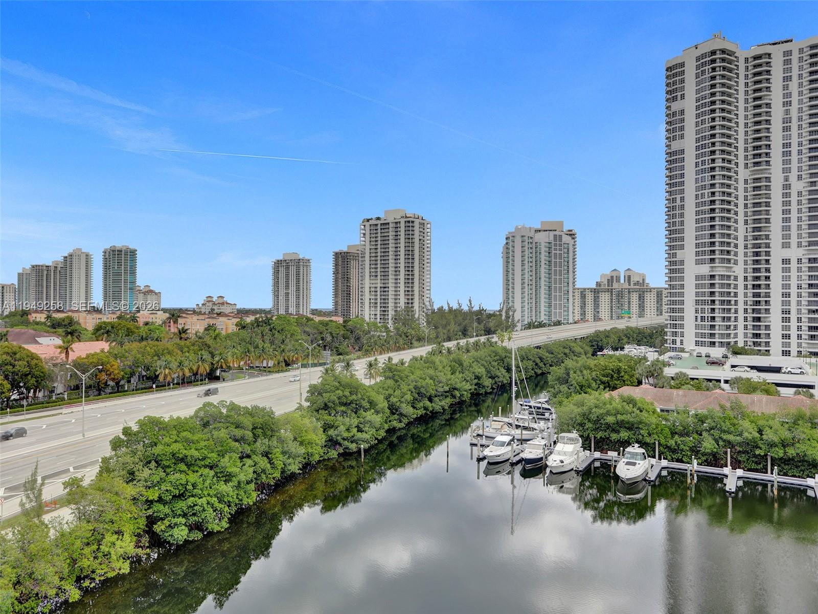 Beautiful corner unit with stunning water views located in the heart of Aventura. This spacious 2-bedroom, 2 bathrooms plus den residence features elegant wood floors throughout and a convenient in-unit washer and dryer. Can be rented immediately, making it an excellent opportunity for investors or end users. Luxury gated community offering full amenities. Prime location close to shopping, dining, entertainment, and major highways. Rented until March 31, 2026