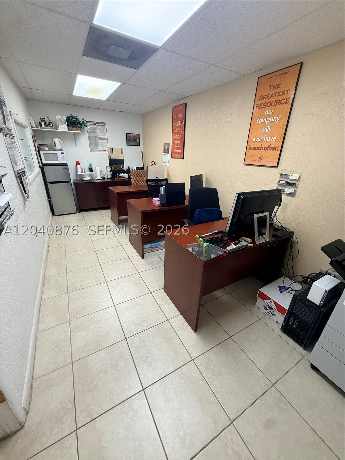 Professional office space available for rent in a secure building. This well-sized office includes access to a conference room and shared reception area, making it ideal for a variety of professional uses such as real estate, tax services, consulting, and other office-based businesses. Convenient, secure, and designed to support your business needs.