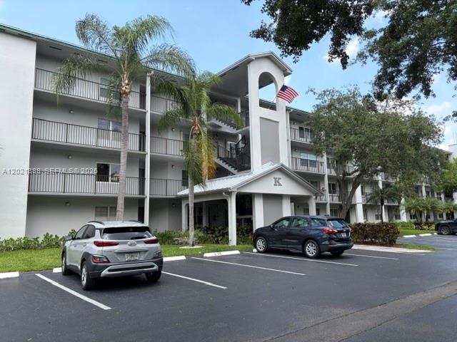 This is a great opportunity to own a condominium in Century Village where you can rent it immediately after closing, no rental restrictions, making it an excellent investment opportunity or the perfect place to call home yourself. Enjoy beautiful Florida sunsets from this furnished one bedroom, one and a half bath condo with amazing golf course views in the desirable resort style community of Century Village. Kitchen has SS appliances and comfortable breakfast nook along with plenty of counter and storage space and pantry. Spacious living and dining room are modernly furnished and access a spacious screened third floor balcony. Master bedroom has sunset view, nightstand, large dresser with mirror and large walk-in closet. Sizable half bath has stackable washer and dryer inside. Condo has wood laminate flooring and tile and is conveniently located only a few steps from elevator. One person must be over 55, second 18+. Courtesy buses, gyms, sauna, heated indoor pool, tennis, billiards, theater & more!