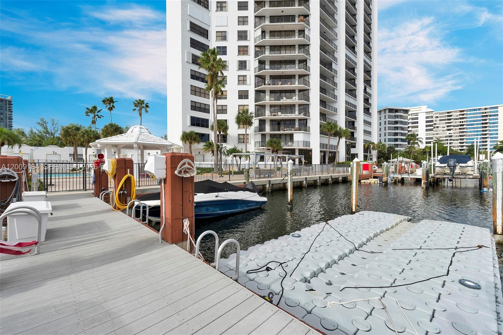 2 DEEDED BOAT SLIPS INCLUDED for up to a 28 foot boat/multiple jet skis! No fixed bridges, right off of Intracoastal Waterway and a short distance from the Haulover inlet and ocean access.  Impeccable 2 bedroom/2 bath unit in highly desirable Three Islands. Modern, open kitchen with granite counter tops, stainless appliances. Large master suite with access to your spacious balcony. New A/C- Heater unit and a new washer/dryer inside the unit! 2 PARKING SPACES! Anchor Bay is a fantastic building with a grand lobby; Marina, gym, spa, spacious pool area, tennis and pickleball courts, BBQ area, roof top terrace.  Total HOA $1416 monthly. Seller will pay off special assessments prior to closing. Currently tenant occupied. Floating docks are available for purchase.