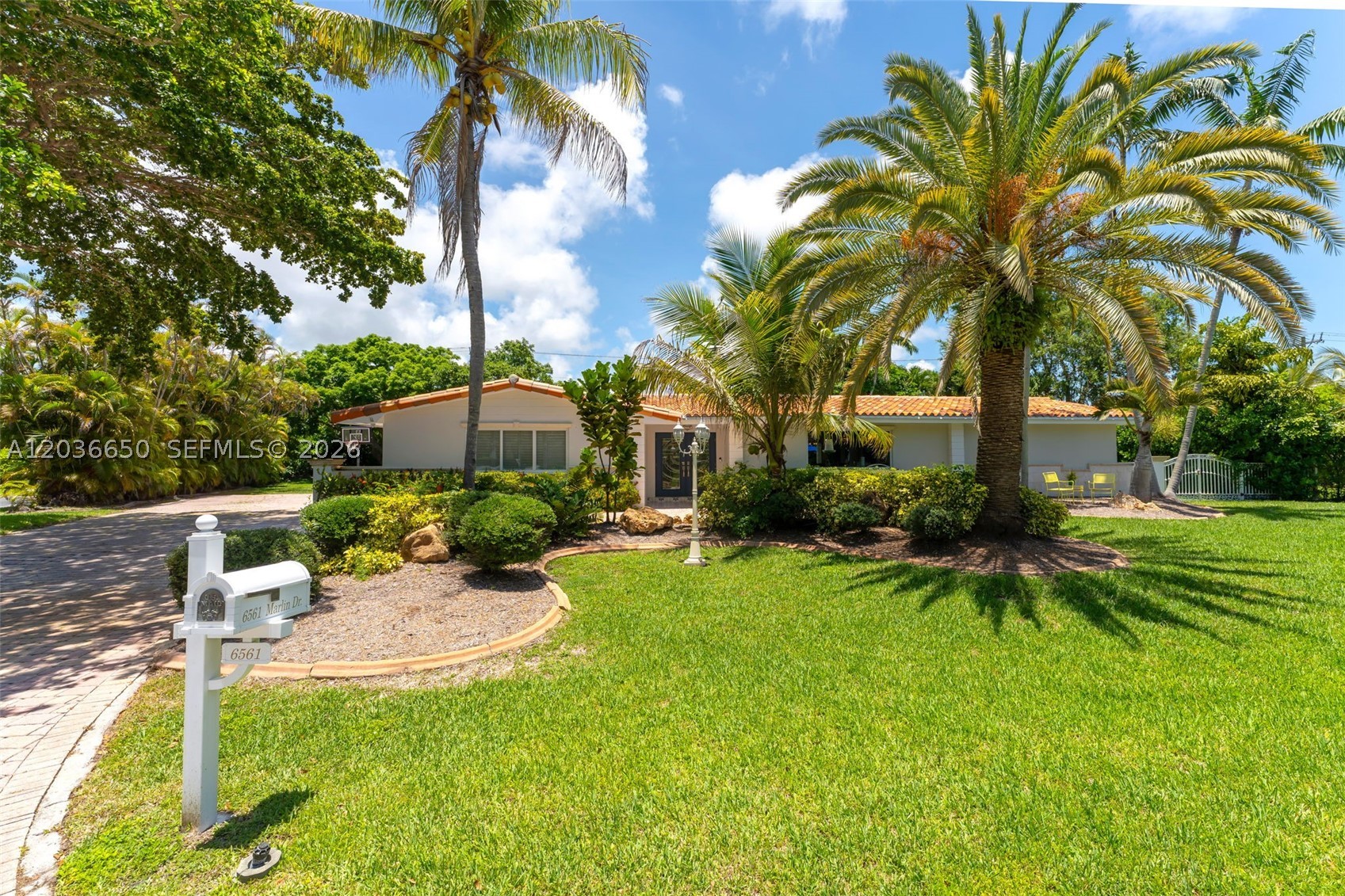 Boater's Paradise in Guard-Gated Kings Bay — Coral Gables
Welcome to 6561 Marlin Dr, an updated and meticulously maintained 4BD/4BA residence offering 2,504 sq ft on a generous 0.37-acre lot within the exclusive, guard-gated waterfront community of Kings Bay. This sought-after enclave offers residents private marina access and a complimentary boat ramp — a true boater's dream, with ample room to park your boat right on the property.
Inside, gorgeous porcelain tile flows throughout, leading to a spacious chef's kitchen complete with a wine cooler and a cozy breakfast nook — perfect for entertaining. The primary suite offers a generous walk-in closet, while secondary bathrooms showcase luxurious marble finishes throughout.
Step outside to your private pool and dedicated grill area, both within a fully fenced backyard that offers both privacy and security. The attached 2-car garage is air-conditioned, providing valuable additional storage.
Ideally located near top-rated schools and just minutes from the best of Coral Gables, this is a rare opportunity to own in one of the area's most coveted waterfront enclaves.