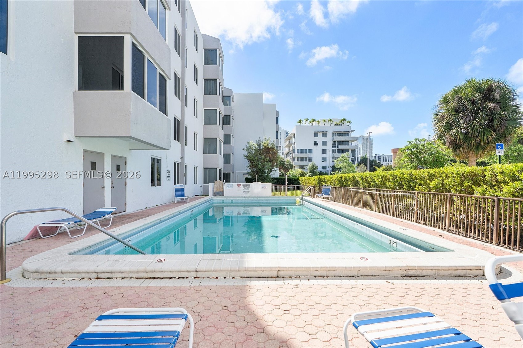 PRICED TO SELL - conveniently located 5 min walk from Sunny Isles Beach, one of South Florida’s most desirable coastal communities  2 bedroom, 2 bathroom residence with a versatile den,. This bright and spacious unit features a well designed layout with comfortable living areas and abundant natural light throughout. The den, conveniently positioned near the kitchen, offers the perfect space for a home office, guest area, or additional seating, adding flexibility to the home. The kitchen provides ample cabinetry and functional workspace, making it ideal for both everyday living and entertaining. The primary bedroom offers privacy and comfort, while the second bedroom is generously sized to accommodate family or guests. Enjoy an unbeatable location just minutes from the beach, fine dining, and premier shopping destinations such as Aventura Mall and Bal Harbour Shops. The area is also known for its excellent schools, including Norman S. Edelcup/Sunny Isles Beach K-8, making it a great option for families.
With easy access to major highways, parks, and outdoor activities, this property offers the perfect balance of lifestyle, convenience, and location. Ideal as a primary residence, vacation home, or investment opportunity in a high-demand area.
Building has upgrades including new roof, concrete repairs, exterior painting, new impact windows, elevator modernization, interior hallway painting, hallway carpeting, pool, parking lot, etc completed 40 re-cert.