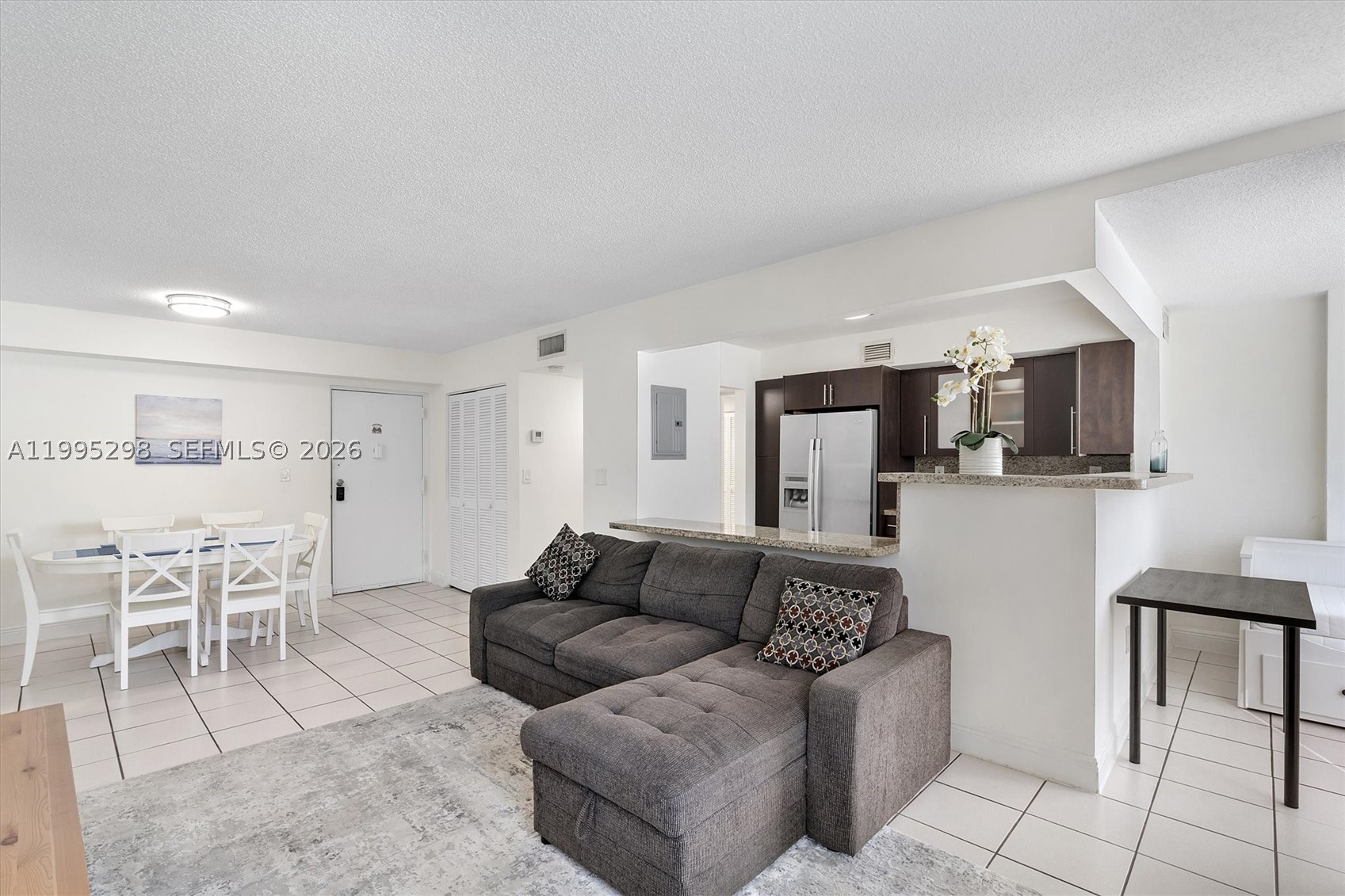 PRICED TO SELL - conveniently located 5 min walk from Sunny Isles Beach, one of South Florida’s most desirable coastal communities  2 bedroom, 2 bathroom residence with a versatile den,. This bright and spacious unit features a well designed layout with comfortable living areas and abundant natural light throughout. The den, conveniently positioned near the kitchen, offers the perfect space for a home office, guest area, or additional seating, adding flexibility to the home. The kitchen provides ample cabinetry and functional workspace, making it ideal for both everyday living and entertaining. The primary bedroom offers privacy and comfort, while the second bedroom is generously sized to accommodate family or guests. Enjoy an unbeatable location just minutes from the beach, fine dining, and premier shopping destinations such as Aventura Mall and Bal Harbour Shops. The area is also known for its excellent schools, including Norman S. Edelcup/Sunny Isles Beach K-8, making it a great option for families.
With easy access to major highways, parks, and outdoor activities, this property offers the perfect balance of lifestyle, convenience, and location. Ideal as a primary residence, vacation home, or investment opportunity in a high-demand area.
Building has upgrades including new roof, concrete repairs, exterior painting, new impact windows, elevator modernization, interior hallway painting, hallway carpeting, pool, parking lot, etc completed 40 re-cert.