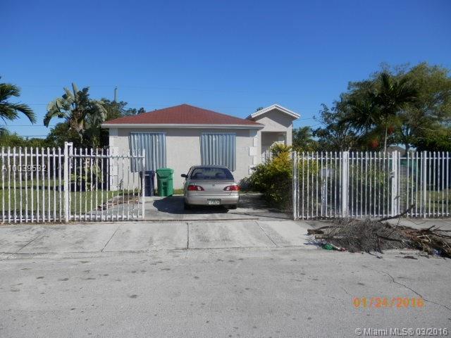 Immaculate 3/2. Fully Tiled. Room for a pool.
