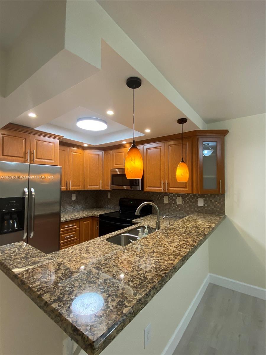 Beautiful 2 bedroom/2 baths apartment/villa. Ground floor. Excellent location in the heart of Kendall close to shopping, major roadways, public transportation, hospitals and excellent schools. Beautiful open plan kitchen with granite countertops and stain steel appliances. Brand new flooring and freshly painted. Large bedrooms with ample closets. Washer and Dryer inside the unit. Waterless tank. Private fenced patio with extra storage space. Very quiet and family-oriented community. Community Pool, Clubhouse and tennis courts. Unit has 1 assigned parking space and guest parking.
Make this your new home!
NO PETS ALLOWED.