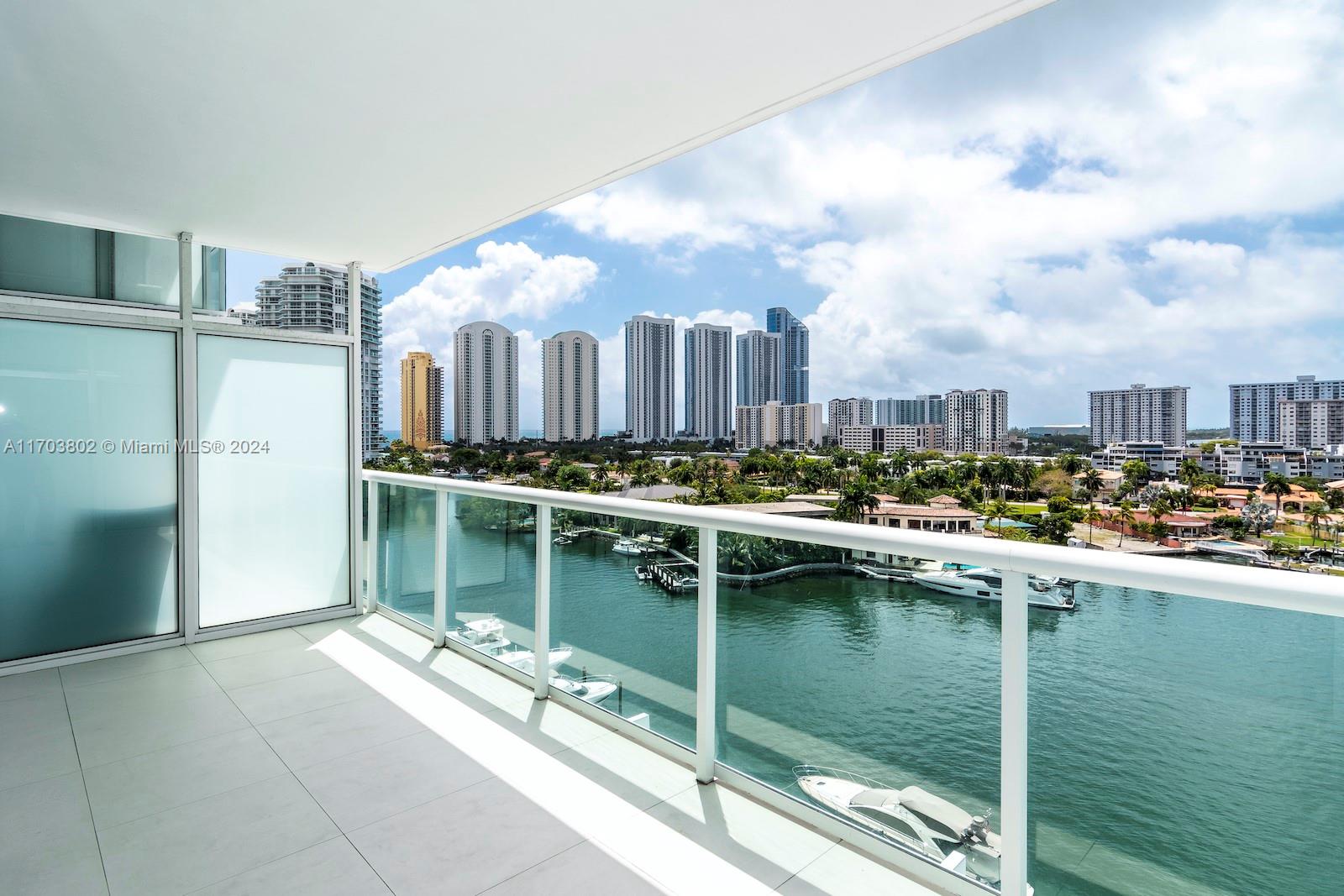 Stunning designer condo with breathtaking water views! This 3-bedroom, 2.5-bathroom residence features sleek white glass tiles throughout. Enjoy world-class amenities, including an infinity pool overlooking the bay, jacuzzi, cabanas, spa, fitness center, tennis court, and an on-site restaurant. Conveniently walk to the beach or take the shuttle for added ease. Live the ultimate coastal lifestyle! Unit rented until May, 14 2026 for $5.5k.