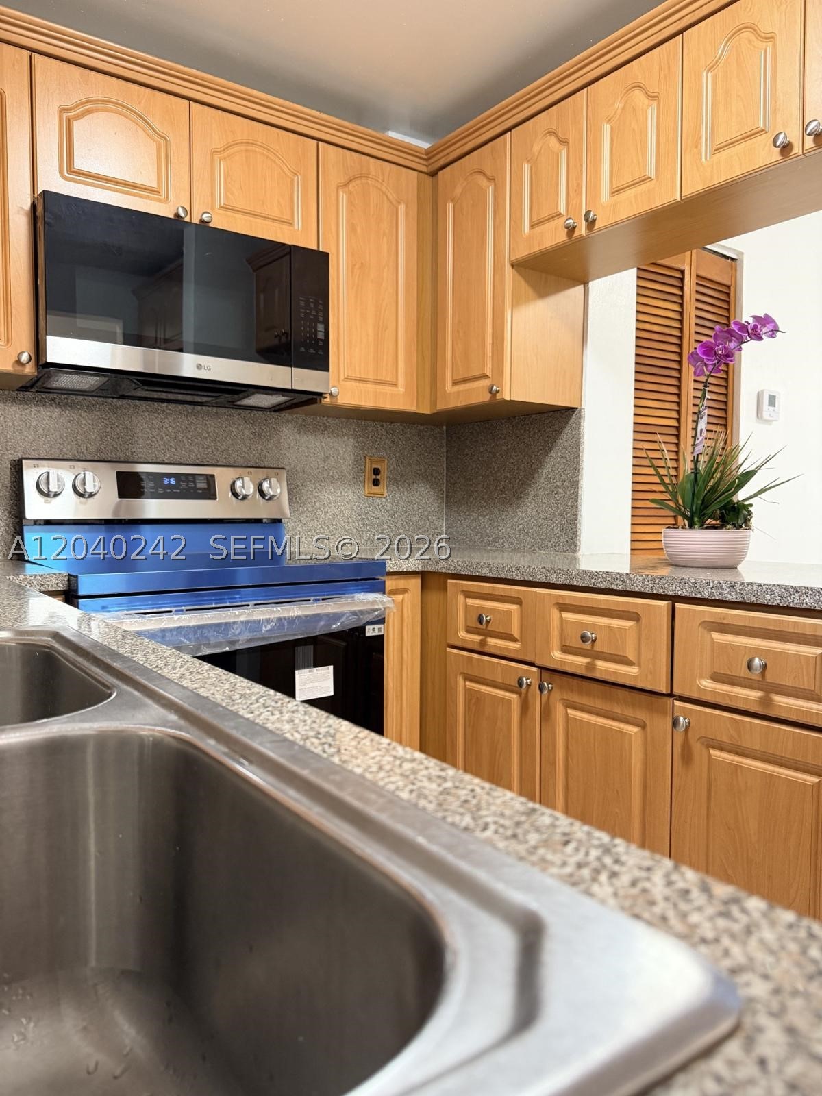PALM-WEST GARDENS CONDO - Residential