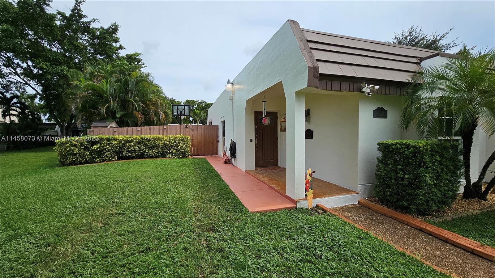 Beautiful Miami Lakes corner villa completely tiled, upgraded wood kitchen cabinets and granite countertops, newer A/C , three very large bedrooms and two bathrooms, very large backyard with covered and screened-in area to enjoy family reunions .  Beautiful green area by the house 4+ parking spaces. Excellent location close to stores, highways, restaurants, movie theaters. No Association's approval needed.