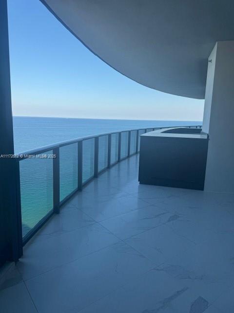 REDUCED!! Amazing Unit, Direct Ocean Front, 4bed/3bath+1hbath+plus service room with bath+ Den/Family room. Terrace with private pool & summer kitchen, private garage, robotic car elevator. Five starts amenities: gym, spa, beach service, private restaurant, theater, virtual games, race car simulator, lounge bar.
Garage is at the lower level (access with private stairs and private elevator) it is not at the kitchen level. Showing requests within 24 hs notice.